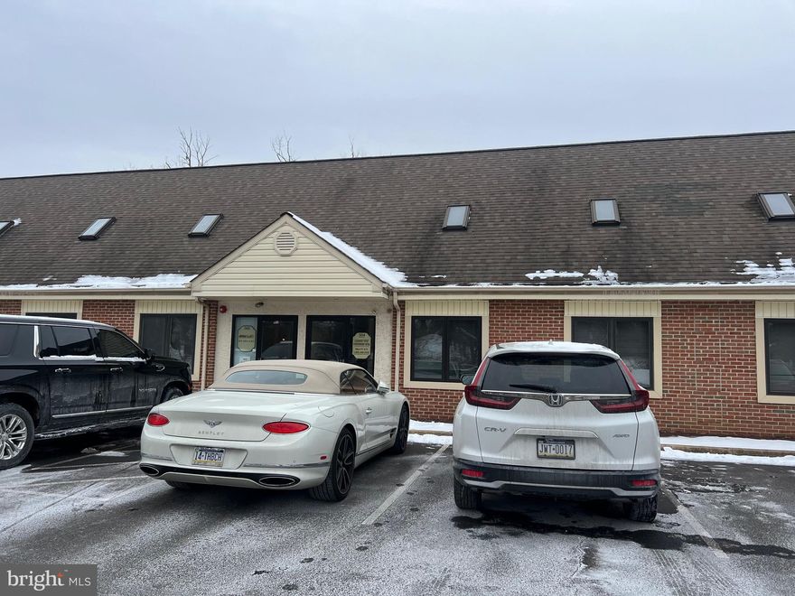 This commercial space is zoned Planned Industrial.  IT was built as a warehouse with office space,   Over the years,  more offices have ben built and now there is approximately 2400 sq ft off ice space on 2 floors and 
650 sq ft of warehouse space with a drive in door and high ceilings.   The building floor plan  is 26.5' by  70 '  . Some offices can be taken down to open up more the warehouse space.  Call Listing agent for more details and for all showings.   This space is also available for rent.  The condo fee is $800 a quarter - includes trash, snow removal, roof, lawn, and common area parking lot, exterior lights.   There is a one time capital contribution cost for the condo association for the Buyer at settlement  of one quarter.  There are 5 parking spots designated for this property according to  condo docs.  Call Listing agent for all details.