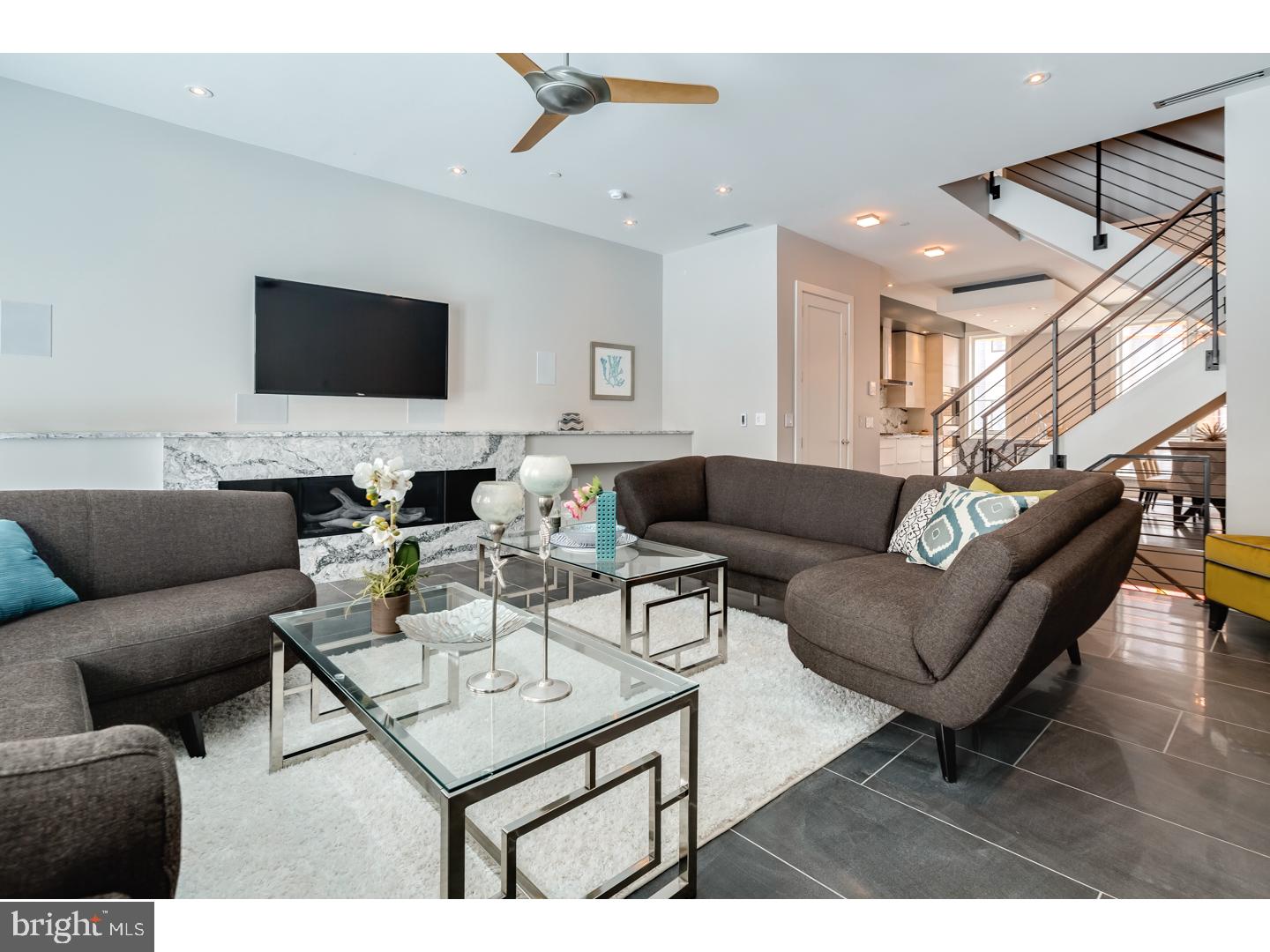 One of a kind New Construction with Elevator, 2-car garage, 4 Decks including two Roof-decks, Smart-home tech system, 4600sq' of Luxury and most finely appointed details in the city. Liberty Estates Townhomes has it all. Included in this sophisticated home is a theater room, and a game room with large wet bar that's perfect for entertaining. The living room, dining area and living room has heated floors. The wide open and extra wide living area has a built in fireplace with stone ledge, and this magnificent space spills onto a rear tiled deck that will make you feel like you are in Miami. The kitchen is spectacular, with Sub Zero and Wolf appliances, custom Italian cabinetry, custom counter tops including a HUGE island with cascading waterfall stone edge and a custom floating ceiling with accent lighting. The extra wide, 20' wide floor plan allows for a huge dining area right next to the kitchen. The interior iron railing system continues throughout the home along an elegant Black Walnut wood staircase. The roof decks are equipped with a kitchenette with sink, fridge and built in grill. The private deck off the master suite, and the deck off the living room supply a ton of outdoor square footage, totaling over 900 Sq feet. All of the bedrooms have great space and have ample walk in closets and accompanying bathrooms with the finest Grohe and Kohler finishes. The full floor master suite has it all, a six foot Kohler soaking tub, heated floors, double vanity, glass tile shower, deck and huge closets. Each bathroom is unique and has only the best materials. The woodwork throughout the home is stunning- including the custom baseboards and solid wood doors t/o. This may be the most well thought out home in the city. Not one inch of space has been wasted. Come visit our 100% complete and ready to be lived in Model home. Still time to customize the other homes in the development. 10 year tax abatement pending!!