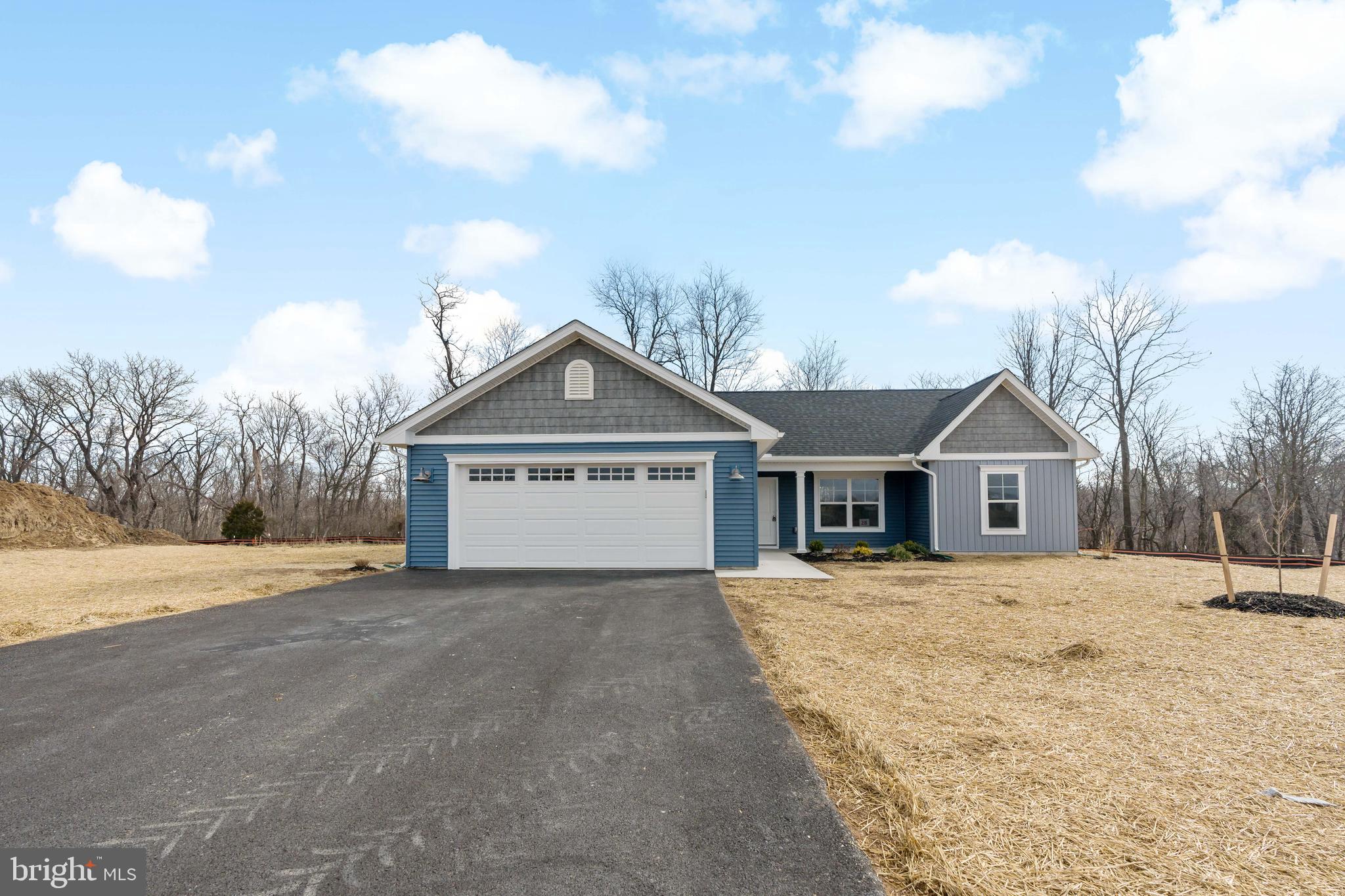 This rancher built by Panhandle Homes is on one of the last remaining lots in the tucked away community of Harvest Glen! Nestled at the end of the street in a cul-de-sac surrounded by trees, this home offers low maintenance living.
Step inside to discover three spacious bedrooms and two full bathrooms. The Owners Suite has a large walk-in closet. The Owner’s Bath has a dual vanity and a large ceramic tile shower with a custom glass shower door. The kitchen has beautiful 42” maple slate soft close cabinets, Level 3 quartz countertops, a large island and stainless-steel, energy efficient GE appliances. Cooking will be a joy with the easy to clean ceramic tile backsplash above the quartz!
The home also comes with a 1-year builders’ warranty for your peace of mind, and you'll stay comfy all year round thanks to the Trane HVAC system which offers a 10-year manufacturer’s warranty.
The pictures are of a similar construction, the same floorplan just different color selections. For this home - the outside of the house is wrapped in rich spruce siding with charming shakes in the gables, and the front door is custom painted to match. The yard is professionally landscaped, adding to the beauty and charm of this home. Schedule an appointment today to view the progress of this home as well as the selections being installed!