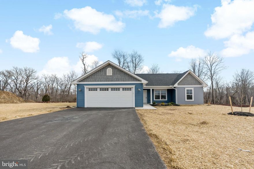 This rancher built by Panhandle Homes is on one of the last remaining lots in the tucked away community of Harvest Glen! Nestled at the end of the street in a cul-de-sac surrounded by trees, this home offers low maintenance living.  
Step inside to discover three spacious bedrooms and two full bathrooms. The Owners Suite has a large walk-in closet.  The Owner’s Bath has a dual vanity and a large ceramic tile shower with a custom glass shower door.  The kitchen has beautiful 42” maple slate soft close cabinets, Level 3 quartz countertops, a large island and stainless-steel, energy efficient GE appliances.  Cooking will be a joy with the easy to clean ceramic tile backsplash above the quartz!  
The home also comes with a 1-year builders’ warranty for your peace of mind, and you'll stay comfy all year round thanks to the Trane HVAC system which offers a 10-year manufacturer’s warranty.  

The pictures are of a similar construction, the same floorplan just different color selections.  For this home - the outside of the house is wrapped in rich spruce siding with charming shakes in the gables, and the front door is custom painted to match. The yard is professionally landscaped, adding to the beauty and charm of this home.   Schedule an appointment today to view the progress of this home as well as the selections being installed!