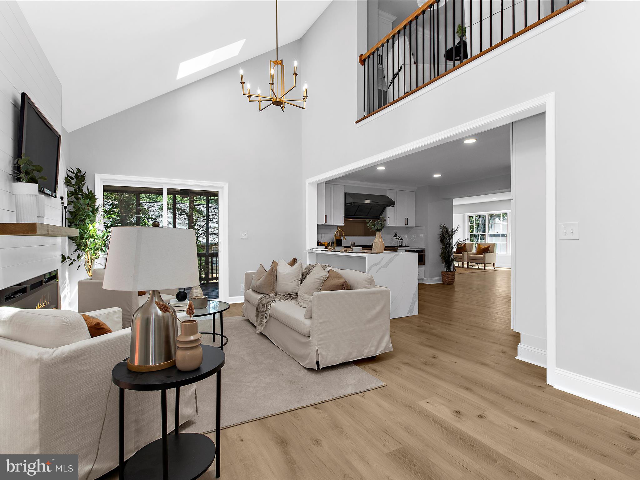 Nearly 3500 sq ft, this fully renovated house feels like a HGTV inspired model home. 4 generous sized bedrooms, and 3.5 baths with an attached garage. Inside you will find a chefs kitchen with quartz counter tops, gold finishes and a $12,000 appliance package featuring a 48" commercial gas stove and 60" double door fridge/freezer, The kitchen overlooks an amazing 2 story living/dining room with custom fireplace and Palladian windows. You also get additional living space, an office and a half bath on this level. Upstairs you will find a large primary suit with his and hers walk in closets and an amazing spa themed bathroom with a double vanity. Complimenting this space is 2 additional bedrooms, a shared loft with custom work station and a full bath. In the lower level you have a rec room with a custom wine bar, a 4th bedroom, full bath and laundry room. There is a screened porch, large deck and a private fenced in backyard. Throughout this home is luxury LVP flooring, add on's, upgraded fixtures, lighting, plumbing, electrical and HVAC. This home is located near the famous Webber's Farm, multiple area schools, close to 95, 696, 83 and a variety of shopping options.