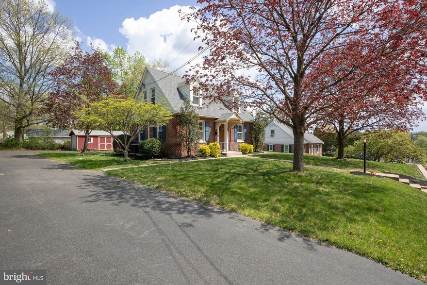 With inviting curb appeal, this ​​c​harming Cape Cod style home ​o​ffers timeless ​elegance and warmth.​   ​As you step inside​, you will be in awe of the seamless​ blend of ​character and ​modern conveniences.  Drenched in natural daylight, this home boasts refreshed interiors with newly installed flooring, wainscoting, and crown molding (2021)​. The ​​beautifully updated kitchen (2023) with heated floors, new door, new cabinetry, countertops, backsplash, recessed and under cabinet lighting, farmhouse sink and new appliances​, the inviting dining room featuring a bow window ​overlooking the neighborhood and living room with a wall of built-in shelves and cabinets complete the first floor.​  The charm and character continues as you check out upper level featuring the main bedroom with a balcony and plenty of built-in storage, two additional bedrooms and completely renovated bathroom (2021) with a subway-tiled shower and ceramic tile floor. The full basement presents endless possibilities-transform it into a recreation room, home gym, or additional storage space. Imagine enjoying your morning coffee on the sun-drenched patio or hosting a backyard barbecue. Conveniently located, this home offers easy access to local amenities, including shopping, dining, and entertainment options, with everything just a short ​walk or drive away. ​With a new roof (2022), hot water heater (2025), central air (2022), a retaining wall, an invisible pet fence and new doors​ (front and balcony in 2025), ​​all this home needs is you!  Just bring your belongings and start living the dream!