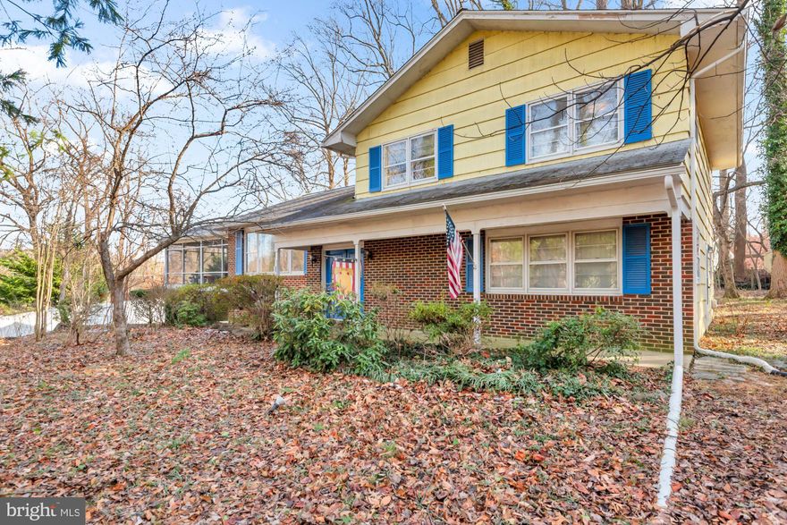 Welcome home to this charming 3-bedroom, 2.5-bath residence located in the desirable Pines on the Severn community of Arnold, Maryland. Featuring a traditional layout with timeless appeal, this home offers hardwood flooring and a welcoming split-foyer entry that leads to the main living level. This level includes a bright living room, kitchen, and dining area, with easy access to a relaxing screened porch—perfect for enjoying peaceful outdoor moments. Three bedrooms and two full bathrooms are also located on this level, including a spacious primary bedroom with a private ensuite bath. The lower level provides additional living space with a cozy recreation room featuring a fireplace and sliding doors that open to the backyard. This level also includes a convenient half bathroom and a dedicated office, ideal for working from home or a quiet retreat. Outside, the property offers a shed with covered parking and an attached garage with abundant storage space. Ideally situated near Gov. Ritchie Highway and Route 50, this home provides easy access to Annapolis, Washington, D.C., the Eastern Shore, and the natural beauty of the Severn River Sanctuary. Join the voluntary HOA for a nominal fee to gain access to the boat launch ramp, community beach and kayak rack. The neighborhood also a playground for community events and childrens' activities. With a 10 year old roof, and 2-year old HVAC system and hot water heater, a new owner will enjoy the benefit of comfort and low maintenance. A wonderful opportunity to enjoy comfort, convenience, and community in a sought-after location.