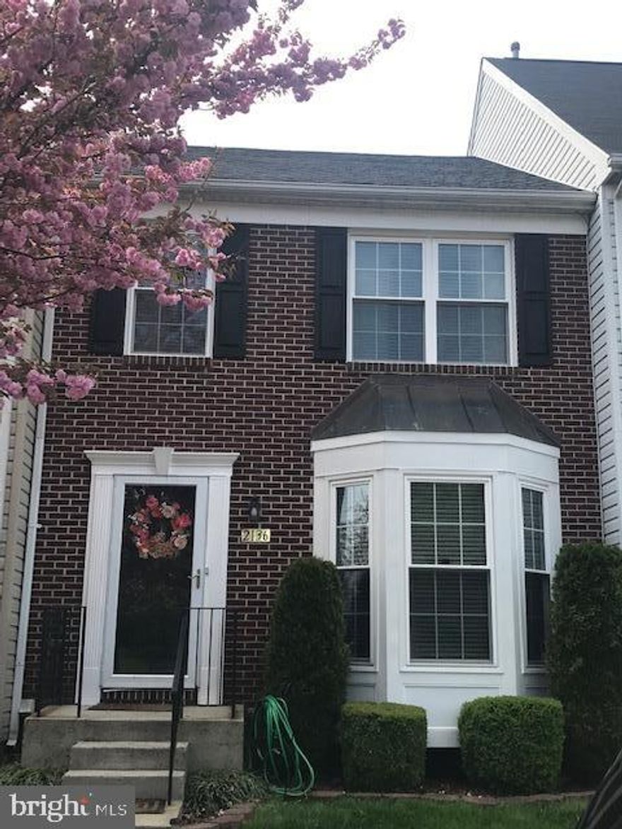 This beautifully maintained 3BR/3.5 BA townhouse welcomes you from the moment you walk through the door! New energy efficient windows &  architectural shingle  roof are just a few added features that you will appreciate.  Spacious layout offering open kitchen/dining w/ bonus bump out leading to deck w/ premium wooded lot surroundings.  Eat in kitchen w/ SS, ample  storage & island perfect for the avid chef.  Gleaming wood floors shine on this main flr thruout! Upper level BRs include a comfortable master ensuite w/full bath/ walk in closet & sitting area overlooking pvt yard.  Finished LL  awaits w/ bonus office area space, full bath + brightly lit rec room w/ a workout area that has access to lower patio for endless entertainment possibilities! Convenient location to 95, APG, shopping & walking nature trails.  See the attached video to fully appreciate this beautiful home.