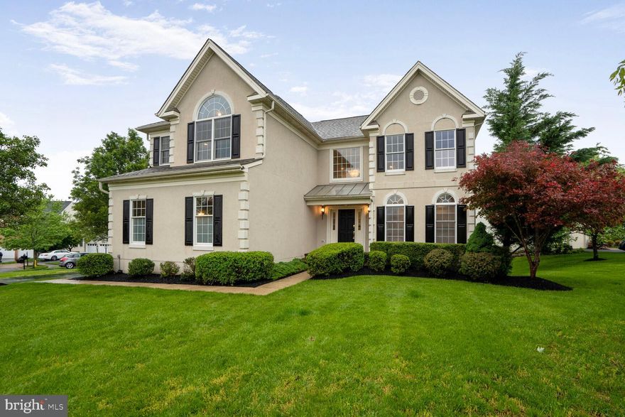 Open Saturday 2-4! Welcome to this beautiful Richmond model by Toll Brothers, ideally situated on a corner lot in a quiet cul-de-sac within the prestigious Dominion Valley Country Club. With a handsome stucco front and side-load garage, this home offers exceptional curb appeal.
Step inside through the covered front entry into a dramatic two-story foyer and family room featuring a gorgeous chandelier and a floor-to-ceiling stone fireplace framed by expansive windows that flood the space with natural light. The formal living and dining rooms are enhanced by elegant floating built-in shelves, ideal for displaying cherished decor. HW Floors span the entire main level.
The gourmet kitchen is a dream, equipped with stainless steel appliances, a center island, ample table space, and stylish finishes throughout. French Doors lead to a newly built (2022) composite deck w/ steps down to the back yard.  A private home office is perfectly located on the main level, along with a spacious laundry room complete with a sink. 
Upstairs, a versatile loft provides the perfect flex space for a secondary family room, playroom, or media area. The primary suite includes a serene sitting area, a large walk-in closet, and a luxurious en suite bath featuring a corner soaking tub, separate shower, dual vanities, and a private water closet. Bedroom 1 enjoys a private en suite bath, while Bedrooms 2 and 3 share a well-appointed hall bathroom.
The fully finished walk-out basement adds even more living space, including a bedroom and full bath, recreation area, and a dedicated media zone—ideal for entertaining or relaxing.
Key Updates Include:
Main Level HVAC: 2017
Upper Level HVAC: 2021
Water Heater: 2017
Roof: 2017
Dishwasher: 2024
Refrigerator: 2024
Wall Oven/Microwave: 2025
New Carpet in Upper Level and Basement. 
Driveway to be sealed on Saturday.
This home combines luxury living, modern updates, and a sought-after location in a gated golf course community. Don’t miss the opportunity to make it yours!