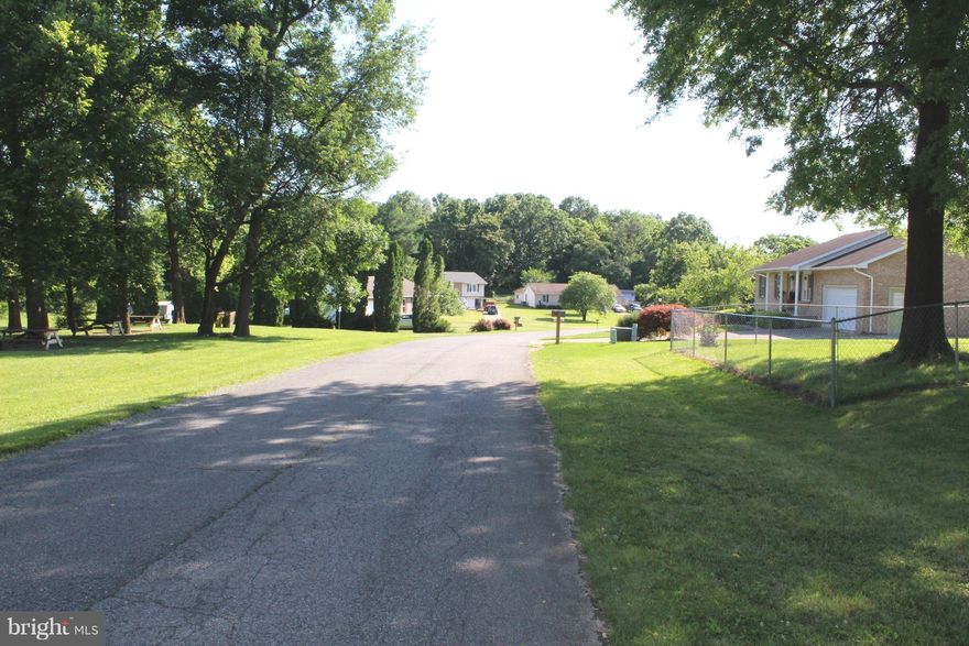 Nice neighborhood with mature trees and landscaping.  Home sits on corner lot with a fenced back yard and a screened back porch.  Home shows well and is in move in condition.  Must see.