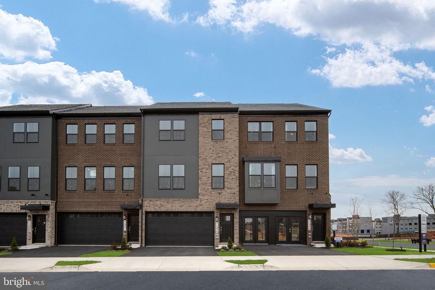 Experience D.R. Horton’s newest community, Innovation Town Center in Manassas, VA, featuring thoughtfully designed 22’-wide, three-level townhomes built for today’s lifestyle. These homes offer up to 2,270 sq. ft. with 3 upper bedrooms and a basement bedroom with full bath for your convenience. Complete with 3.5 baths, a 2-car front-load garage, a 15’x8’ rear deck, and private backyard space. Each townhome includes D.R. Horton’s signature America’s Smart Home Package and professionally curated interior design palettes. The open-concept main level showcases modern finishes and adaptable spaces perfect for working, relaxing, and entertaining. April delivery!
Up to $5,000 closing cost assistance with use of DHI Mortgage. *Photos, 3D tours, and videos are representative of plan only and may vary as built.