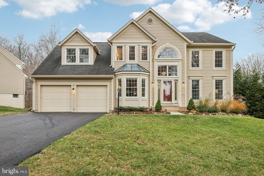 ***COMING SOON***  Come see this great 4 bedroom, 4.5 bath colonial in highly sought after Bridgewater in Ellicott City!  This exceptional home showcases significant improvements including all new windows that were replaced in 2020, BRAND new driveway repaved in 2025, and a newly constructed chimney and fireplace (2025) that anchors the sunken family room space.   The kitchen renovation completed in 2019 delivers both style and functionality with granite countertops, great island, stainless steel appliances and pantry.  There are two doors out to the maintenance free deck that was replaced in 2018, which extends the living area outdoors—perfect for entertaining or quiet evenings at home.  You can sit on the deck and overlook the large backyard, or take the steps down to the yard as well.  Back inside, the main level also has a home office featuring new luxury vinyl plank flooring installed in 2023, and has french doors you can close for your work-at-home privacy.  There is a large living room that leads to the formal dining room with hardwood floors.  The laundry room is also on the main level, which leads you out to the 2-car garage.  Upstairs you'll find the 4 bedrooms and 3 full bathrooms.  The expansive primary suite serves as a true retreat, highlighted by vaulted ceilings, two closets, 4 large windows  and a spa-inspired en-suite bathroom with a double vanity, large jacuzzi tub and private water closet.  All bedrooms are equipped with ceiling fans.  The lower level is finished and has the 4th  full bathroom, separate room that could be a potential 5th bedroom, gym, hobby area, you name it!  The 2nd family room has a wet bar and also a slider that walks straight out to the backyard.  Basement also includes extensive crawl space and additional storage area. Don't miss this rare opportunity to enjoy turnkey living in one of the area’s most desirable locations. Be sure to explore the virtual tour!  Available for home tours starting January 2nd!  Don't miss it!