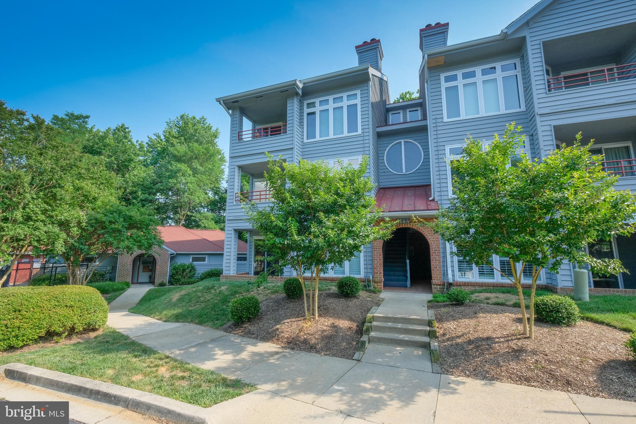 Sunny Luxury 2 Bedrooms 2 Baths Condo with Water Views in Desired Annapolis Community - Available NOW! This stunning bright condo unit home has an open floor with a fireplace, two balconies and a wall of windows along with recessed lighting. The kitchen is modern and fabulous with white granite countertops, tile backsplash, cooktop range and stainless-steel appliances. The common areas have hardwood plank floors and unit has a stackable washer and dryer. Unit provides lots of storage closet space and 2 Bedrooms located in the rear of the unit with a Primary Suite which includes a private rear deck overlooking woods and water. The condo is set in a secluded peaceful community with woods and water views along Chesapeake Bay and Lake Heron with a community pool. Within a 4-minute drive allows access to several water taxi stops to take you over to Ego Alley to enjoy the vibrant waterfront scene. The area offers a rich history of Annapolis by visiting the nearby historic sites and landmarks, breathtaking views and charming atmosphere. The rent includes water/sewer/trash and condo fees. Small pets will be considered case by case for additional monthly fee. This is a non-smoking unit.