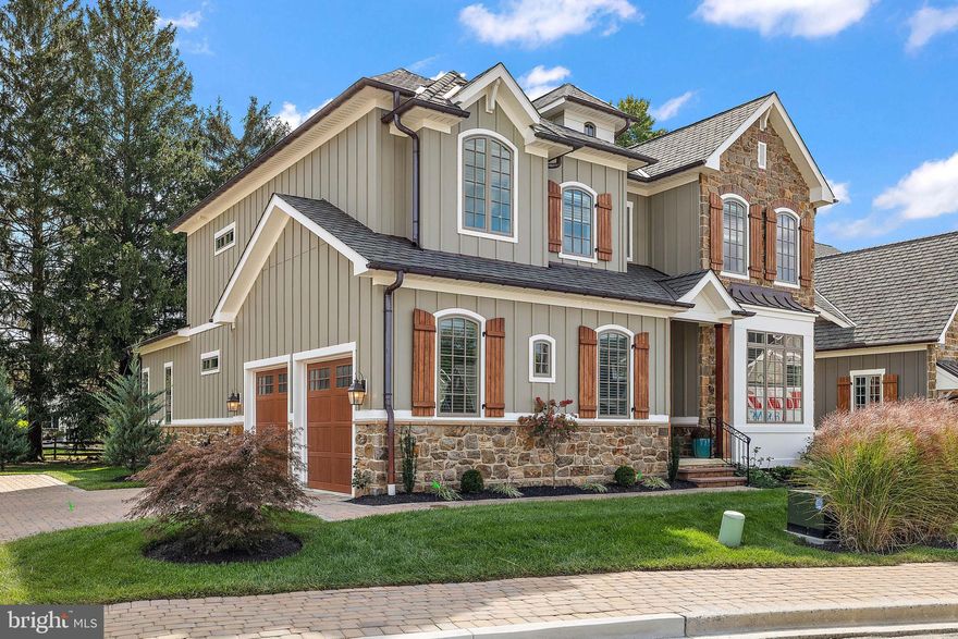 Welcome to 1228 Coulee Way, an elegant sanctuary nestled in the prestigious Columbia Place community of Wilmington, DE. This remarkable residence is the first resale of the Greenville model—a rare architectural gem with only two other homes bearing its sophisticated design. This exquisite 3-bedroom, 3.5-bathroom home spans an impressive 3,975 square feet, masterfully crafted by Reybold, renowned for their high-quality, energy-efficient construction using Pella windows, Hardie plank siding, and locally quarried natural stone. The home is nestled within a soon-to-be gated community, offering peace of mind and exclusivity. Thoughtfully customized to prioritize wheelchair accessibility, this home seamlessly combines functionality with elegance. An elevator servicing all three levels and a lift in the garage highlights the commitment to accessibility, offering ease of movement without sacrificing the home's sophisticated design. Wide doorways and open spaces further enhance the accessibility, ensuring a comfortable living experience for all residents. Upon entering, you are greeted by an open floor plan that seamlessly integrates the gourmet kitchen, dining, and living areas, highlighted by a cozy gas fireplace. The kitchen boasts top-of-the-line finishes, perfect for culinary enthusiasts and entertainers alike. Additionally, the main floor features a private den or home office, a laundry room, and a powder room. The home is thoughtfully designed to accommodate diverse lifestyles, featuring two luxurious primary suites, one on each level, ensuring comfort and accessibility for all. An elevator serves all three levels, exemplifying convenience without compromising on elegance. Upstairs, an open loft media room offers a versatile space for relaxation or entertainment, alongside a guest bedroom with a full bathroom and the second primary suite. The unfinished lower level provides abundant storage and a partially finished area currently serving as a wine tasting and storage room. Outside, a beautifully finished deck invites you to enjoy the serene surroundings. The natural beauty of Brandywine Creek Park is just steps away, with its miles of scenic walking trails. The community clubhouse is an excellent gathering space, complete with meeting rooms, a catering kitchen, and a state-of-the-art fitness center. The home integrates cutting-edge technology with a Smart Home Moen leak detection and automatic water shut-off system, ensuring peace of mind against water damage. Additionally, a whole house water filtration and water softener system enhances the quality of living. Security Instruments Alarm offers enhanced security, while upgraded smart lighting throughout the home creates an ambiance of sophistication and convenience. This property stands as a testament to sophisticated living, offering unparalleled luxury and exclusivity in a vibrant 55+ community. Embrace the opportunity to be part of this elegant enclave—1228 Coulee Way awaits your discovery.