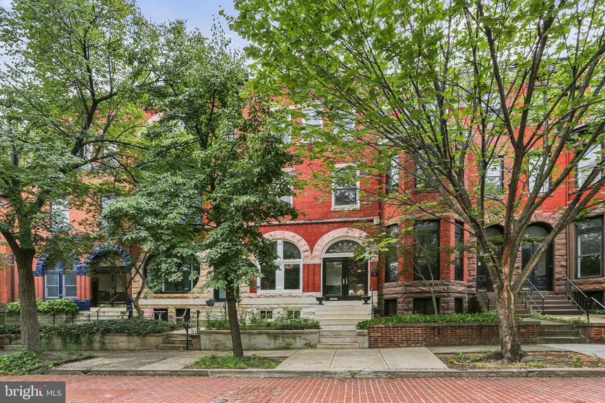 A Grand Victorian with Modern Sophistication in Historic Bolton Hill
Welcome to 1726 Linden Avenue — a meticulously updated 4-bedroom, 5-bathroom Victorian townhome that blends historic charm with modern luxury in the heart of Baltimore’s Bolton Hill neighborhood. While currently configured with four bedrooms, the home’s generous space and flexible layout offers the potential to easily feature as many as six bedrooms by converting the second-floor office and the third-floor loft/family room into additional bedrooms.
Spanning over 3,600 square feet across three finished levels, this residence showcases soaring ceilings, two elegant staircases, original architectural details, and stunning natural light throughout. Step through the gracious entry and into an expansive living room anchored by a magnificent fireplace and original hardwood floors, flowing seamlessly into a formal dining area, perfect for entertaining or relaxing evenings at home.
The bright and airy kitchen is a true showstopper, featuring Carrera marble countertops, stainless steel appliances, an oversized island, a full walk-in pantry, and a sun-drenched breakfast area with views of the landscaped rear patio.
Two luxurious suites — one on the second floor and one on the third — could serve as the primary suite, each with its own en suite bath and walk-in closet. The second floor also includes a versatile office space with a sun room, while the third floor offers a large family room or loft area that could be reimagined as another bedroom. Practicality meets convenience with laundry rooms on both the basement and third floor.
You’ll also find an expansive unfinished basement with over 1,000 square feet of storage space, ideal for a workshop, gym, or future finished living area.
Out back, enjoy a serene brick courtyard and garden space — a private urban retreat perfect for dining al fresco or gardening. Two deeded parking spots complete the package, offering rare convenience in this sought-after neighborhood.
Recent updates include bathroom renovations, stair restoration, fresh paint, all thoughtfully completed to preserve the home’s original charm while supporting a modern lifestyle.
Ideally located just blocks from MICA, Penn Station (Amtrak/MARC), and the vibrant cultural scene of Mount Vernon and Station North. Quick access to I-83 and Light Rail makes commuting a breeze.
Don't miss this rare opportunity to own a fully updated, turn-key historic home on one of Bolton Hill’s most desirable blocks.
