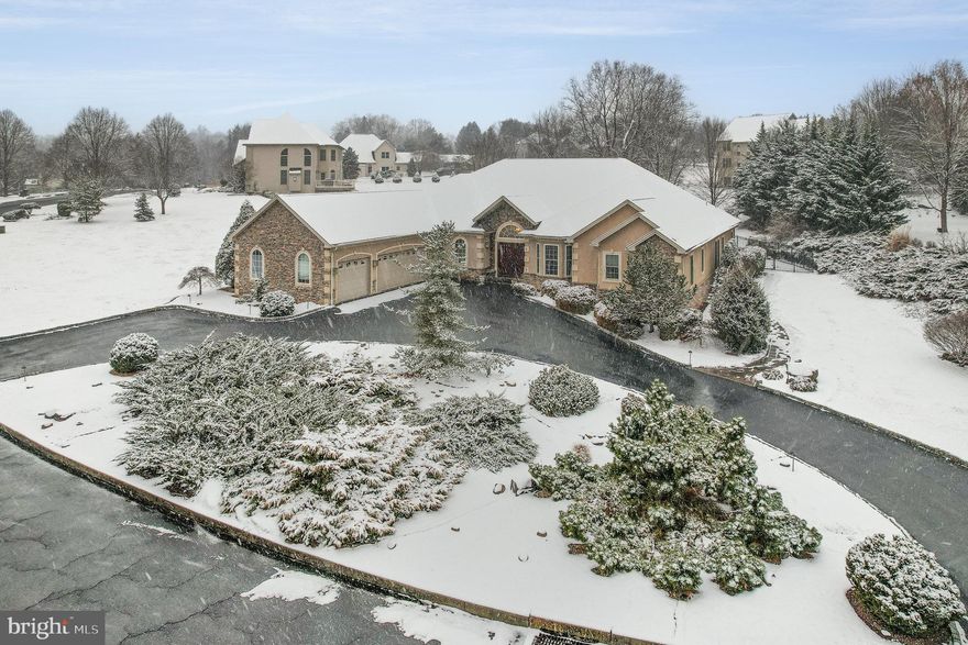 Discover a one-of-a-kind custom ranch home nestled in the exclusive High Meadow community of Lower Allen Township. Step into an expansive interior filled with natural light and refined details. The impressive family room welcomes you with soaring ceilings, gleaming hardwood floors, and a custom-crafted media display that sets a sophisticated tone. An adjacent formal dining room, accentuated by intricate wood inlays and a coffered ceiling, provides a perfect backdrop for memorable gatherings, while a charming nook offers serene views of your private patio and backyard.

The heart of this home is its gourmet kitchen—a chef’s dream featuring illuminated custom glass cabinets, dual Sub-Zero refrigerator/freezers, and a premium Wolf 6-burner gas cooktop with a handy pot filler. A commercial-grade exhaust system and an expansive 5’x14’ Butler’s Pantry with a wine and beverage fridge ensure both style and functionality. Just off the kitchen, a versatile in-law or au pair suite comes complete with its own full bath, tiled walk-in shower, double-bowl sink, and ample closet space—ideal as an office, art studio, or guest retreat.

A dedicated home office by the foyer enhances the flexible layout, leading you through French doors into a luxurious primary suite. Enjoy a peaceful sitting area overlooking the landscaped grounds, his and hers walk-in dressing rooms outfitted with custom built-ins, island with jewelry drawers and a spa-inspired bath boasting a vaulted ceiling, jetted tub, European-style walk-in shower, and separate water closet. Two additional generous bedrooms, linked by a Jack-and-Jill bath with elegant custom features, complete the main level.

From the three-car garage with electric car set-ups, a spacious mudroom and laundry area serve as a practical drop zone, complemented by a half bath featuring a unique vessel sink. Venture to the lower level to uncover over 1,500 additional square feet of versatile living space. Here, a large family room, two extra bedrooms with full egress windows, a full bath with walk-in shower, and a second laundry room provide possibilities for a rec/hobby room, home gym or extra storage. An adjoining hallway lined with tongue-in-groove cedar closets offers even more room for seasonal storage.

Sitting on .76 acres, the exterior boasts a fenced yard, extensive hardscape and a sprinkler system.  

Perfect for multi-generational living or those seeking elegant guest accommodations, this distinctive home is also ideally located near the scenic Liberty Forge golf course, Arcona’s boutique shops and eateries, the historic Yellow Breeches Creek for outdoor adventures, and  RoundTop Mountain Resort. Welcome to a lifestyle of luxury, flexibility, and convenience!  A joy to own.