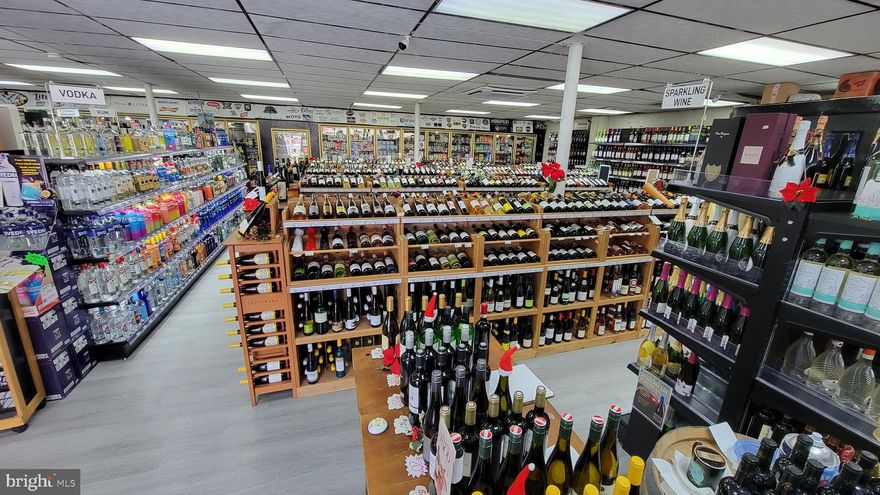 Well Established Maryland Discount Beverage Center Has Been Serving The Cumberland Community For Over 50 Years With An Established Loyal Customer Base.  High Visibility With Attractive Digital Pylon Signage Welcomes You To This Free Standing Building Approximately 3500 SQ/FT Of Retail Space Which Includes A Unique Convenient Drive Thru  Retail Window A Convenient Means To Accommodate Customers When Shopping.  Ideal Rent Only $10.18 SQ/FT  Increases Profit Margin Considerably, Newer Roof, Two HVAC Systems And More !  The Entire Store Was Renovated In 2023 With Significant Interior Upgrades That Included Two LG Inverter Heating & Cooling Systems, New 40 Foot Shipping Container In Addition To A 30 Foot Trailer For Excess Storage, New Upgraded Vinyl Flooring, New Gondola Shelving With LED Lighting, New Counter Tops, Double Sided Digital Signage, Large 70 Foot Sign On Roof Of The Bldg For Enhanced Exposure,  Automatic Exterior Parking Lights, NRM Power Saving System For Walk In Cooler & In 2024 New Copland Condensing Units & TXV Expansion Valves Replaced In The Oversized Walk In Cooler.