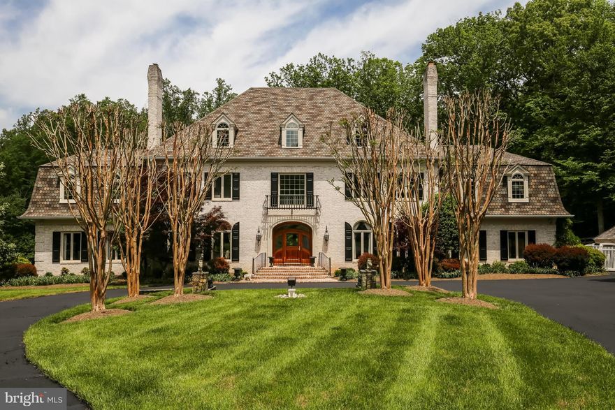 STEAL THIS timeless Potomac estate built in '96 on private 2.68 acre w/ award-winning pool & grounds! This classic all brick home features an updated Chef's kit, elegant formal rooms, high ceilings, six fireplaces, hunt club/library & fantastic views from all 4 levels. Luxurious master suite incl separate sitting rm & marble bath. Fantastic, finished lower level w/full walkout.