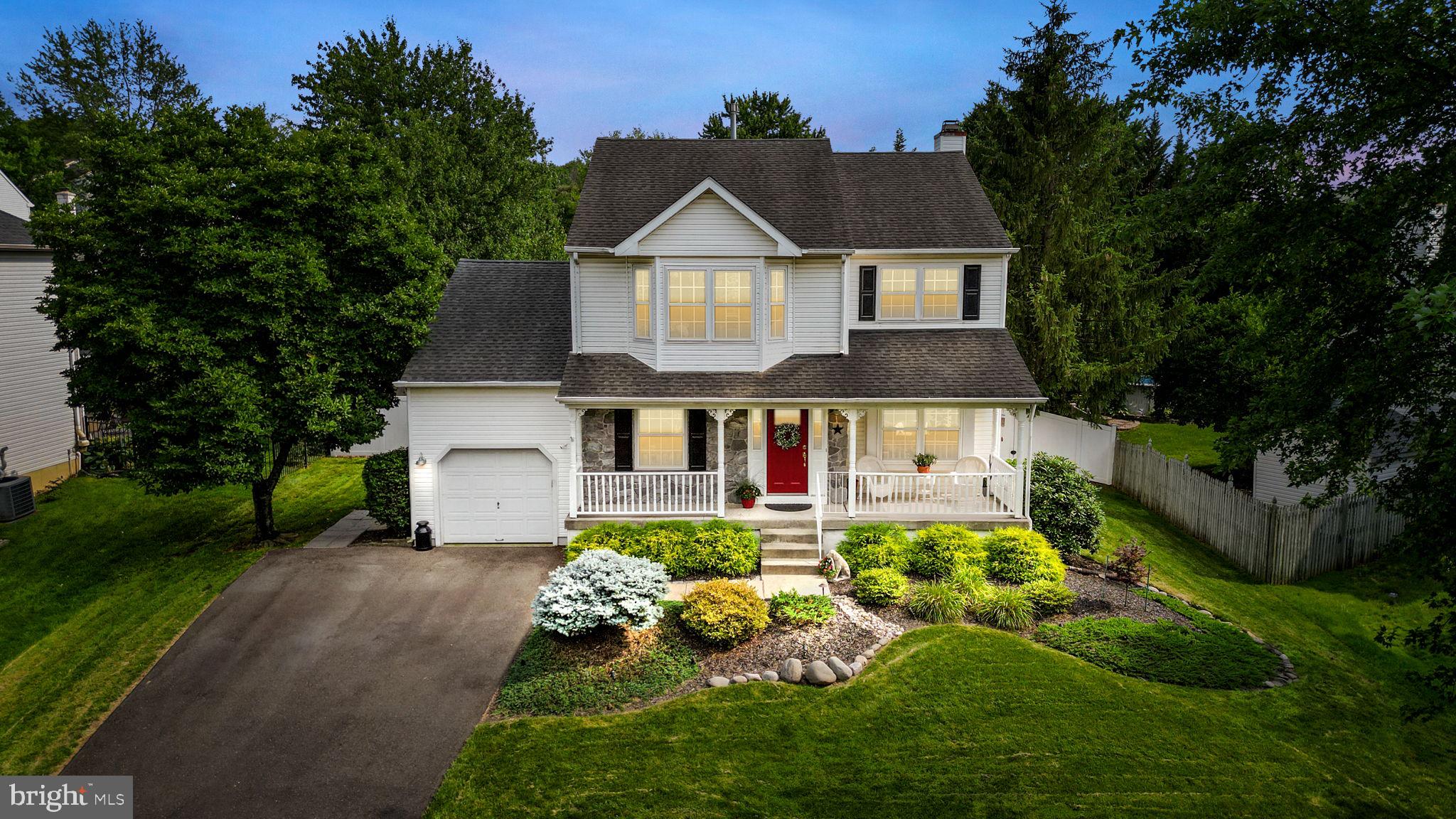 Welcome to 2353 Deer Path Drive! This beautiful home located in the highly sought-after Forest Glen community offers a warm and inviting atmosphere from the moment you step onto the front porch. The well-maintained exterior and manicured landscaping make it a delightful place to enjoy your morning coffee or relax with a good book.

Upon entering the home, you'll immediately notice the care and love that has gone into maintaining it. The first floor features stunning Brazilian hardwood floors throughout, except for the laundry/mud/powder room area, which has ceramic tile. This area also conveniently has a private door to the rear yard.

To the right of the front door, you'll find a bright and airy living room or den area, offering plenty of natural light and flexibility in how you choose to use the space. On the left side of the entrance, there's a gracious dining area, perfect for hosting gatherings of friends and family. The dining area has easy access to the beautifully remodeled kitchen, which has been thoughtfully designed with desirable white Shaker cabinets, cushion close drawers and doors, undercabinet lighting, roll-out shelves in the lower cabinets, and attractive glass cabinets with interior lighting to display your special stemware and dishes.

Adjacent to the kitchen is the family room, featuring a cozy gas fireplace and providing beautiful views of the large rear yard through a double patio door. The outdoor living space is a true oasis, with a tranquil koi pond and a covered paver patio complete with a wood fireplace and TV, making it a perfect spot for relaxation and entertainment. The deep, fenced backyard is well-maintained and adorned with lovely gardens and birdhouses, offering plenty of space to bring your backyard dreams to life.

Heading to the second floor, you'll find the primary bedroom, which boasts a beautiful bay window, vaulted ceilings, and a walk-in closet. The updated primary bathroom offers a convenient stall shower and a double bowl comfort height vanity with granite tops, providing both functionality and style.

Flanking the primary bedroom are three spacious secondary bedrooms and a full bathroom, ensuring ample space for family members or guests. But there's more! The finished basement adds even more living space, where the current homeowners have set up a pool/ping pong table area, a TV zone, and a workout area. The basement also provides additional storage and presents an opportunity for you to add your personal touches.

Thank you for taking the time to explore this wonderful property at 2353 Deer Path Drive. If you have any further questions or would like to schedule a viewing, please don't hesitate to reach out. Happy house hunting!