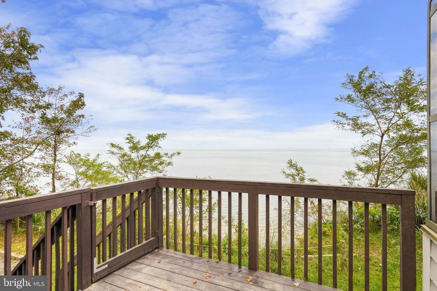 RECENTLY REDUCED!!  Welcome to "Eagles Nest!"  Every Day is a Vacation with the Spectacular Chesapeake Bay Views from the Multiple Decks of this Home in the Sought After Beach Community of Western Shores!  If Nature is Your Passion this is the Place to Be.   For A Small Annual Fee of $75.00 this Private Beach Community has much to offer with Beach, Pavilion, Picnic Area and Playground.  Enjoy the Beautiful Sunrises from Your Sunroom. and Deck.  This 3 Bedroom 3 Bath Home with Loft, Sunroom & Masonry Fireplace has been Freshly Painted with New Flooring and Carpeting.  Don't Miss Your Opportunity to Live in this Secluded Community.  Schedule Your Private Showing Today!  All Visitors...Please Do Not Go Beyond the Rope Fence!  Thank you!
