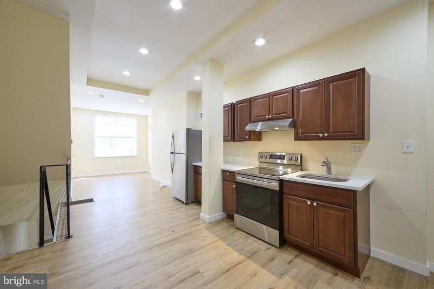 Welcome to 1558 N. Randolph Street, a versatile end-row townhouse located in the desirable Olde Kensington neighborhood of Philadelphia. This well-maintained residence offers flexible living options and is ideal for owner-occupants, multi-generational families, or investors seeking income potential. The property can function as a single-family home or as two separate units, depending on your needs. The second floor features a full kitchen, two spacious bedrooms, and two full bathrooms, with convenient access to a large deck overlooking the surroundings. The lower level includes its own kitchen, one bedroom, one full bathroom, a finished basement area, and a washer and dryer. A side door on the main level provides direct access to the fully enclosed backyard — a rare private outdoor space perfect for children, pets, or casual entertaining.

Additional highlights include central heating and central air conditioning throughout, two private entrances, and thoughtful layout that balances privacy with shared living possibilities. The home offers ample natural light and comfortably accommodates queen- or king-size bedroom furniture.Situated in Olde Kensington, this property is just steps from the popular Billy Penn Studios and enjoys the neighborhood’s convenient location near Fishtown and Northern Liberties. Residents benefit from easy access to Philadelphia’s vibrant dining scene, cultural attractions, major hospitals (including Temple University Hospital and Jefferson Health), and professional sports venues. The home is also close to Fairmount Park, public transportation, and major highways, with Philadelphia International Airport approximately 20 minutes away. Whether you are looking for a primary residence with room to grow, a multi-unit investment property, or a combination of both, 1558 N. Randolph Street provides practical flexibility in a sought-after location. Please schedule a private showing today to explore this rare opportunity in one of Philadelphia’s up-and-coming neighborhoods!