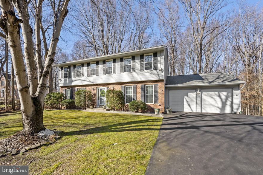 Stunning colonial situated beautifully in a serene, private, 1.3 acre cul de sac location.  You will immediately feel at home upon walking in as gleaming hardwood floors throughout the main floor and freshly painted interiors greet you.  The main floor is highlighted by an expansive kitchen with tons of custom cabinetry, stainless steel appliances, island AND separate table area.  This all opens and flows seamlessly into the family room which is nicely anchored by a brick gas fireplace with custom built-ins.  It doesn't stop there as the outside is set up for entertainment and enjoyment with a four season room, built-in hot tub and expansive deck all overlooking the peaceful, wooded landscape. Once you are done imagining all of the fun and relaxation that will happen, head back inside and upstairs to find 4 very generous bedrooms to include a primary with a walk-in closet, make-up vanity and ensuite bathroom.  Downstairs in the walk-out basement you will find a bright and open rec room with wood burning stove along with an expansive storage and laundry area.  The seller has loved this home and has done everything perfectly to prepare it of the next owner to do the same - it is truly turnkey and priced perfectly for a quick sale!  This is the inventory that everyone is waiting for so don't hesitate!