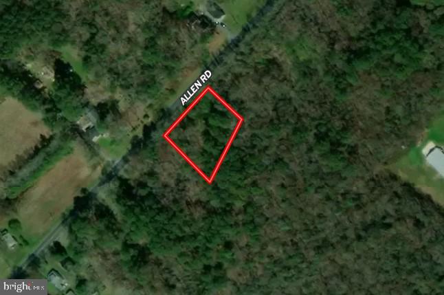 .52+/- acre lot. Residual structure from an old house. No perc or well information on file with the county. Property is being sold as is where is.
