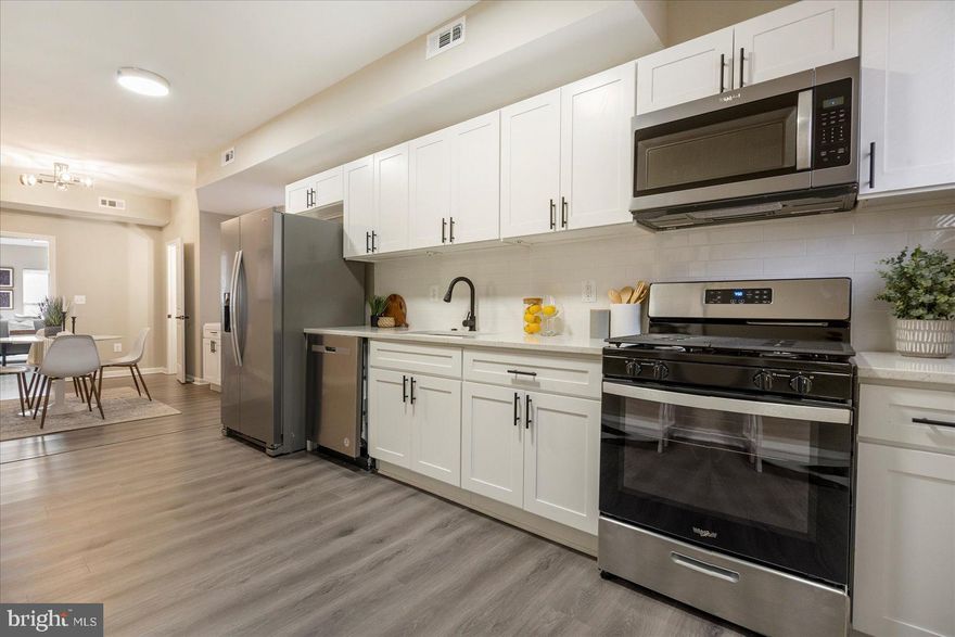 DON'T MISS THIS ONE!   This HUGE - NEWLY RENOVATED 4 level, 5BR  2 1/2 BA home, with partially finished lower level, is located on a charming block in the historic neighborhood of Upton’s Marble Hill.   Over 2,000 square feet of finished living space! You'll love the new kitchen's white shaker cabinets, stainless steel appliances, and quartz counters!  NEW luxury vinyl flooring on the 1st and lower levels.  NEW carpet on the 2nd and 3rd levels.  NEW bathrooms with custom tile!  And MUCH MORE!  Easy access to I 83 and 95, Penn Station for MARC & Amtrak commuters, the Bolt bus, light rail and metro routes. The cultural district offers The Arena Playhouse, Meyerhoff Symphony Hall, The Lyric Baltimore and The Pennsylvania Avenue Black Arts and Culture district offers live performances while the Capital Lounge LLC, Tilted Row, and On the Hill are local dining favorites all within blocks!