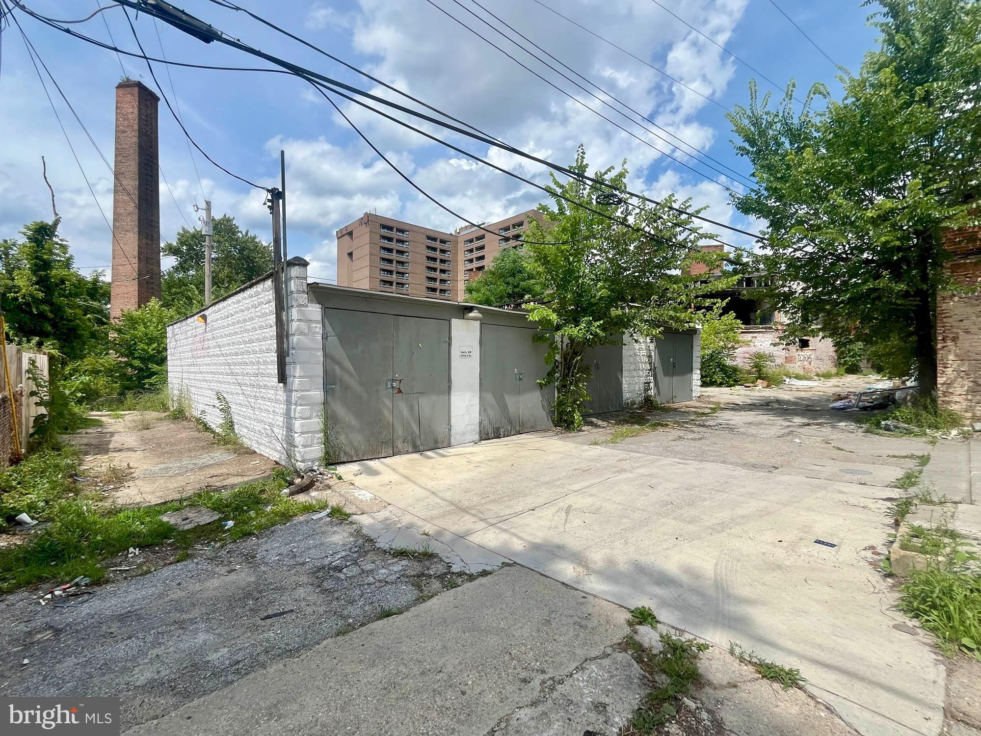 ABSOLUTE ONLINE REAL ESTATE AUCTION TO THE HIGHEST BIDDER OVER $5,000!! Online Bidding Opens - Monday, August 4, 2025. Bidding Closes - Wednesday, August 6, 2025 at 1:00 PM. List price is opening bid only. 2910 Buena Vista Street is a one-story concrete masonry garage building located in the Franklintown Road neighborhood of West Baltimore. The structure comprises approximately 1,225 square feet and is believed to be arranged as four parking or storage areas, each with secure exterior access. The property has been used for storage and garage purposes and sits on a triangular-shaped lot with dual alley access. Located just three blocks north of US-40 and within close proximity to Hilton Parkway and the West Baltimore MARC station, the site offers excellent accessibility for both local and regional users. With alley access on both sides, multiple secure bays, and proximity to dense residential blocks and major commuter routes, the auction presents an opportunity to acquire a functional, small-footprint building suitable for garage rentals, contractor storage, vehicle parking, or potential redevelopment in a well-positioned West Baltimore location.
