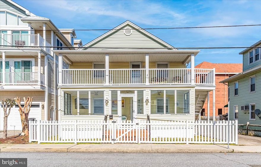 Do not miss out on this rare opportunity to own a unique DIRECT BAYSIDE WATERFRONT home in Downtown Ocean City! This stunning 5-bedroom, 4-bathroom waterfront home features 2 private boat slips and breathtaking canal and bay views, all just a short walk to Ocean City's famous boardwalk and beach. Perfectly positioned in a desirable downtown location, this spacious property offers easy access to restaurants, nightlife, shopping, and local attractions while still maintaining a quiet, family-friendly setting.
The home offers two fully remodeled kitchens featuring granite countertops, custom cabinetry, and tile backsplashes, along with two washers and dryers, making it ideal for extended family stays, vacation living, or rental flexibility. The first floor includes 3 bedrooms and 3 bathrooms, along with a beautifully updated eat-in kitchen featuring a custom boardwalk-style dining table overlooking the water. A bright southern-facing sunroom provides the perfect space to enjoy morning coffee while watching the sunrise. Luxury vinyl plank flooring has been installed throughout both levels of the home. The second floor is a separate private living space, accessed via an exterior staircase, and features two spacious bedrooms and one bathroom. This level also includes a southern-facing balcony perfect for relaxing with your favorite drink while enjoying stunning water views. A large waterfront sunroom offers additional entertainment space and includes a shuffleboard table for family fun. Outdoor living is truly exceptional. The backyard features a large composite deck (188” x 158”) overlooking the canal, perfect for entertaining, fishing, crabbing, and watching unforgettable sunsets. The property also includes two private boat slips, allowing you to bring your boat and enjoy immediate access to the bay. Additional exterior features include plenty of space for yard games such as cornhole and a putting green, making this home perfect for family gatherings, guests or renters. A detached garage provides excellent storage for fishing gear, bikes, kayaks, paddleboards, surfboards, and beach equipment. Located just blocks from the beach and boardwalk, you are within walking distance of popular Ocean City attractions and restaurants including Fishtales, Reel Inn, Franco’s Pizza, Layton’s, Starbucks, Dunkin’, and the world-famous White Marlin Open. This property has also demonstrated strong rental performance, generating approximately $110,000 annually over the past two years, making it an excellent investment opportunity, vacation home, or primary residence. The possibilites are endless so make an appointment today to see this rare opportunity to own this downtown waterfront home!