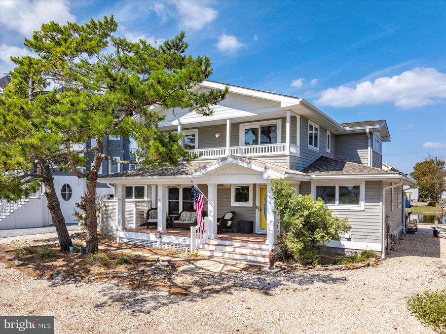 Welcome to a home that perfectly blends effortless style with waterside charm, an inviting 4-bedroom, 3-bath gem on the canals of South Bethany Beach. With over 2,400 square feet of furnished living space, this property is just steps from the sand yet offers a calm, private setting with water views from nearly every angle.
The open floor plan extends seamlessly into a light-filled three-season room, creating the ideal backdrop for gatherings and relaxation. Sunlight fills the family room with wood wood-burning fireplace, while the spacious kitchen featuring upgraded counters and coastal-style cabinetry invites you to cook and entertain with ease. A first-floor bedroom with an adjacent full bath and nearby laundry adds convenience for family and guests.
Upstairs, the luxury owner’s suite boasts oversized water views, a spa-like bath with a walk-in shower, and a true retreat-like feel. Two additional guest bedrooms with a full bath provide plenty of space for visitors. Fresh new carpets add comfort throughout, while the expansive rear deck offers the perfect spot to soak in the scenery.
Boating enthusiasts will appreciate the brand-new bulkhead with direct access for a boat or jet ski. Practical features, including parking for 4+ cars, a storage room, and an outdoor shower, make beach living easy. Just minutes from the sand and surf, this home offers the perfect blend of comfort, convenience, and the timeless South Bethany lifestyle.