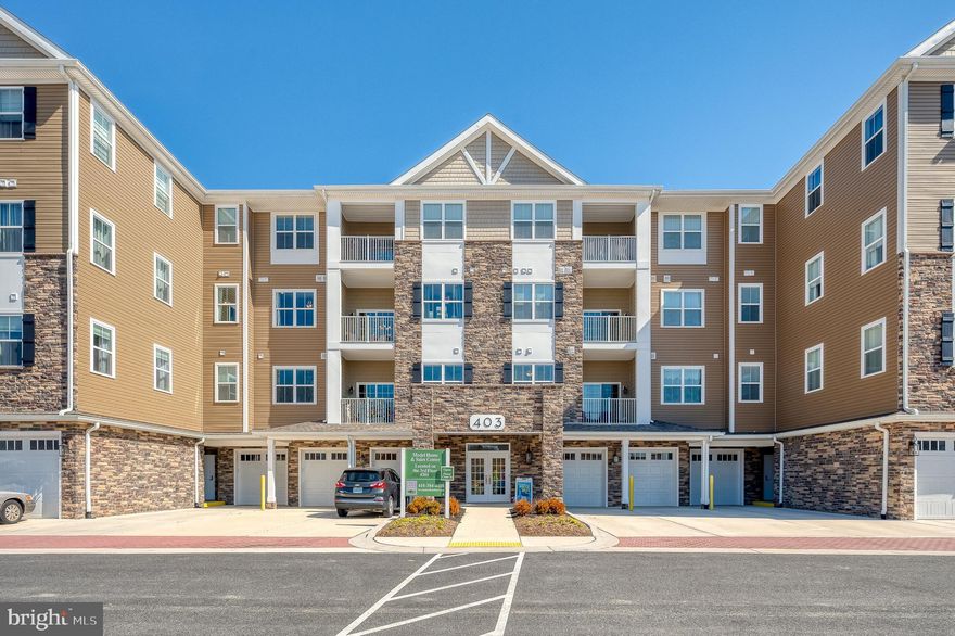 Priced to Sell! Storage and garage are INCLUDED in this resale unit. Life imitates vacation in this luxurious elevator condo in Bulle Rock. This almost new condo includes a private heated garage and a private storage closet (both deeded). There are two spacious bedrooms, each with walk-in closets and ceiling fans. The upgraded gourmet kitchen  has oversized 42-inch maple cabinets, quartz counters, Moen fixtures, stainless steel appliances, island with breakfast bar, pantry, and pendant lighting. It opens to the dining area with access to the balcony. The large owner’s suite has separate access to the balcony as well as a walk-in closet and private full bath. The laundry room has cabinetry – and new washer and dryer included. The second bedroom has access to another full bathroom in the hall. The community amenities include a stunning 37,000 square foot clubhouse, two tennis/pickleball courts, bocce court, shuffleboard court, fitness center with professionally trained staff, a full-time lifestyle director, a business center/cyber cafe, a private library, indoor/outdoor pools, miles of scenic walking/bike trails. Bulle Rock Golf Course is ranked as the best public golf course in Maryland, located minutes from I-95 and an easy drive to Baltimore, Washington, D.C., Wilmington, Philadelphia, Pennsylvania, and Annapolis. Convenient access to the Marc/Amtrak station for quick day trips to New York or D.C. Come see for yourself! This home is almost new so you can enjoy lower transfer taxes as well as fresh paint, window treatments and more.