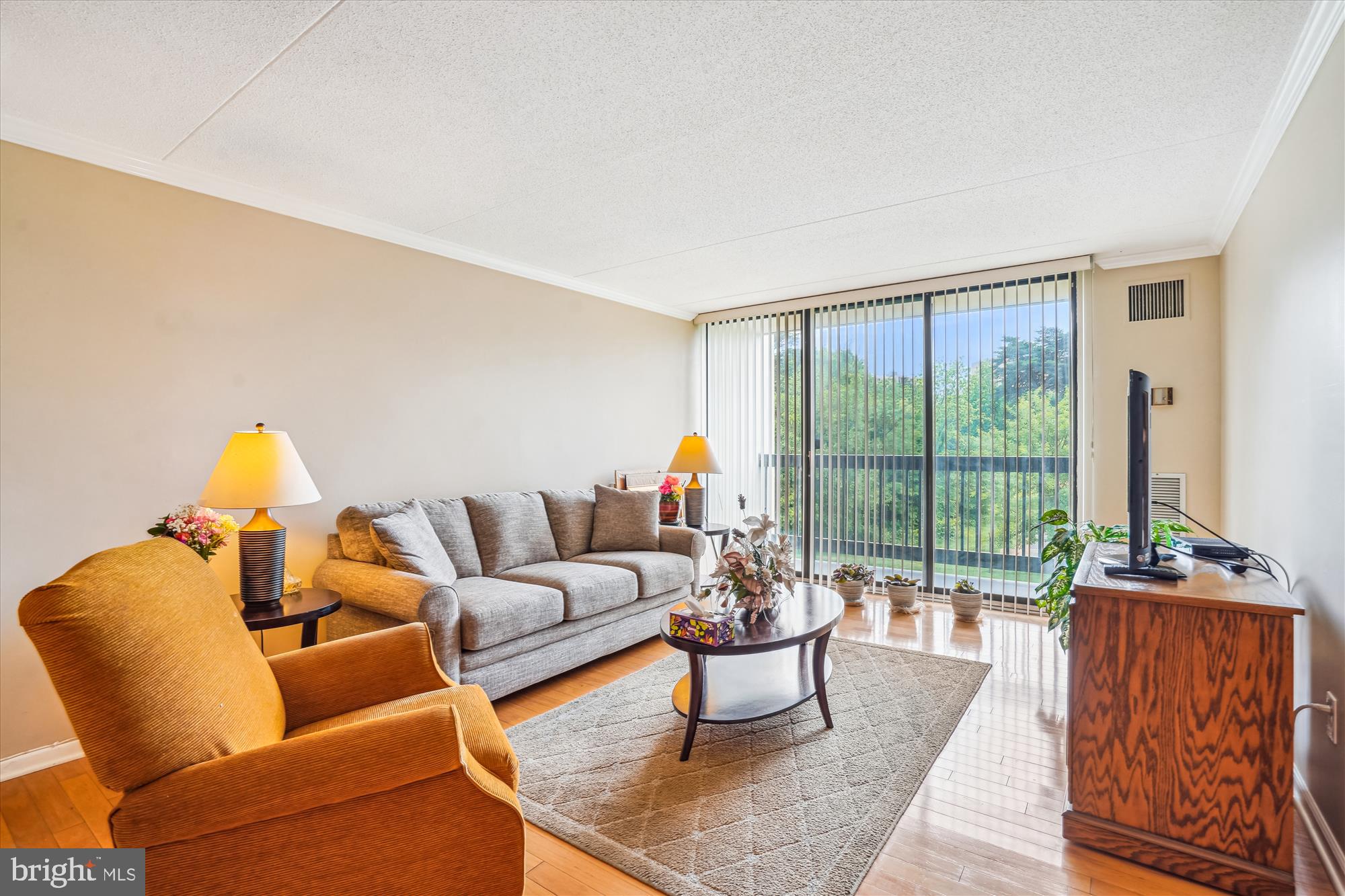 Lovely, tranquil 2BR 2BA condo located in the popular Sentinel of Landmark offering washer/dryer in unit, garage parking, balcony, wood floors and more!