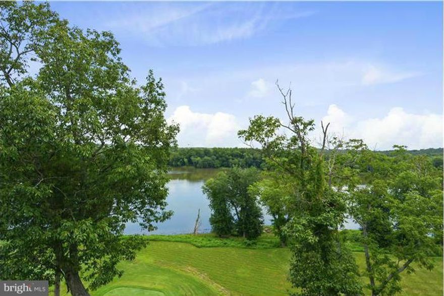End Unit Stunning Views of the Potomac River. Showcased thru Soaring Paladium window. Overlooking 17th hole this property has only been used as a second home. So very lightly used. Great Room floor plan with full dining room. Master suite with sitting room over looking Potomac River. Full guest suite  Including private deck. Its all about the views. Gated Country Club living.