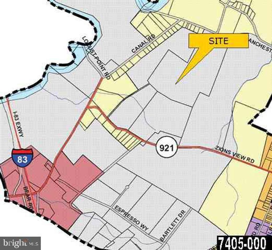 90.7 acre industrial parcel with preliminary LDP for 12 building lots with approved "on lot" well and septic.  Public water and sewer are not accessible at this time.  Also includes 3 rented homes, barn and large out building operated as self storage business.  Perk/probes have been approved; wet lands approval and ?Corp of Engineers? stream crossing permit.