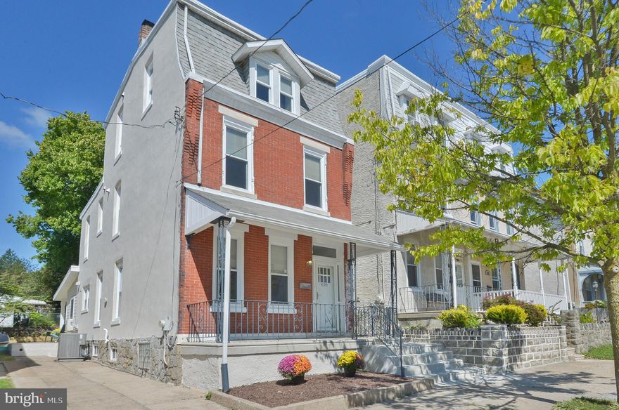 Amazing owner-architect renovated 3-story single home with 3 bedrooms, 2.5 baths, a driveway
with 2-car parking, and multiple porches and patios on a level lot. The house features energy-efficient
central air and heating supplemented with mini-split units on the 1st and 3rd floors. The flooring
throughout is environmentally friendly solid bamboo complementing the clean lines and modern
design.
The covered front porch has a gated wrought iron railing overlooking a planting bed waiting for your
green thumb. The 1st floor has an open layout with a living room, dining room, and kitchen. There are
high ceilings and loads of windows that bathe the downstairs in natural light. The U-shaped kitchen
has a breakfast bar, granite countertops, tiled backsplash, stainless appliances, and ample
cabinets.
Beyond the kitchen is a sun-filled family room addition with a half-bath, coat closet, and door leading to a covered rear porch and side patio. The rear yard has a raised-bed garden ready for your
flowers, shrubbery, and next year’s vegetables.
The 2nd floor has two spacious bedrooms, each with a large closet. There is a versatile open space at the
top of the stairs between the two bedrooms that could serve as a home office, sitting room, entertainment area, bedroom or whatever your imagine allows. The laundry hook-up is conveniently located in the hallway closet. The full bath has a heated porcelain tile floor.
The 3rd floor primary bedroom suite includes a cathedral ceiling, spacious walk-in closet, and a
European-style open bath with heated porcelain tile floor and a large tiled shower with glass sliding
doors.
The full-size and full-height dry basement with Parged stone walls houses the 150A electric panel,
high-efficiency instantaneous water heater, and the HVAC system. It offers ample storage and
includes a large workbench.
This uniquely imagined home is centrally located between the Ridge Avenue shopping district and the
popular dining, boutique shopping, and street fairs in vibrant downtown Manayunk. Hiking, jogging,
and biking opportunities abound at nearby Kelly Drive and the Wissahickon section of Fairmount Park.
Public transportation is within easy walking distance.