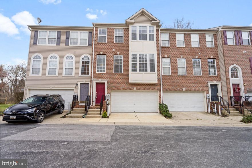 Welcome to your dream home nestled in the tranquil Waters Edge Community! This beautifully updated 3-bedroom, 2-full & 2-half bath townhome offers a perfect blend of modern comfort and serene natural surroundings.

Step inside to discover a meticulously renovated interior boasting a full kitchen refresh in 2024, featuring brand new appliances including fridge, stove, microwave, and dishwasher. The bathrooms have been lavishly upgraded with all new Moen fixtures, ensuring both style and functionality. Enjoy the convenience of a bedroom level washer/dryer installed in '19, a new hot water heater in '23, an upgraded high efficiency 4.5-ton HVAC system in '21 for year-round comfort, and brand new carpet and plank flooring throughout the entire home!

The middle living level welcomes you with a spacious living room, an inviting eat-in kitchen, and sliders leading to an oversized deck where you can unwind while soaking in the privacy and serene views of the adjacent trees and creek. Upstairs, retreat to the king-sized primary bedroom with a walk-in closet and an en-suite upgraded bathroom featuring a separate tub and shower. Two additional bedrooms and a second full bathroom complete the upper level.

Head downstairs to the lower level, where you'll find a cozy recreational room highlighted by a feature corner gas fireplace with a stone surround, a convenient half bath, and a walkout level door to the rear yard, perfect for outdoor entertaining.

With 9-foot ceilings on the middle level and vaulted ceilings on the top level including all bedrooms, this home is flooded with natural light, creating a bright and airy atmosphere throughout.

Additional features include a 2-car garage, located off a quiet side street in the Waters Edge Community, which offers green areas, a private community swimming pool, snow removal, lawn maintenance, and is surrounded by forest conservation areas, ensuring plenty of trees and nature to enjoy.

This home also offers ultimate commutability, with easy access to major routes—just 5 minutes to 95/100, 15 minutes to Fort Meade, 20 minutes to Baltimore, and 35 minutes to DC. Don't miss the opportunity to make this stunning townhome yours—schedule your showing today!