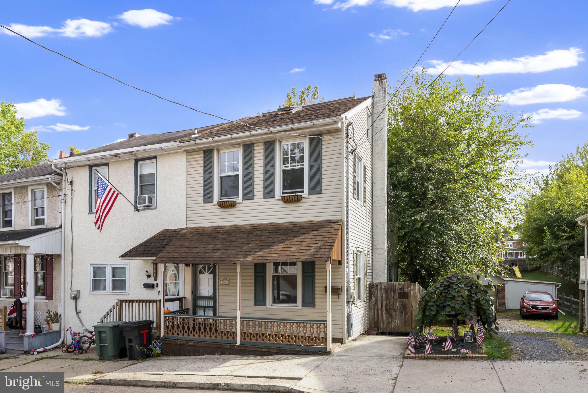 Beautifully updated 3-bedroom home in the desirable Spring-Ford School District! Step inside from the charming covered front porch into a bright, open living room with fresh paint, stylish new flooring, and built-in shelving. The spacious eat-in kitchen features butcher block countertops, freshly painted cabinets, and newer appliances. Just off the kitchen, you’ll find a versatile bonus room—perfect for a dining area, home office, or extra storage. Sliding doors lead to a large deck overlooking the fenced-in yard, ideal for entertaining, relaxing, or playtime. Upstairs, two nicely sized bedrooms share a refreshed bathroom with a new vanity and toilet, while the third bedroom offers a private retreat. With its modern updates, outdoor living space, and walkable neighborhood, 146 Hall St is a wonderful place to call home.