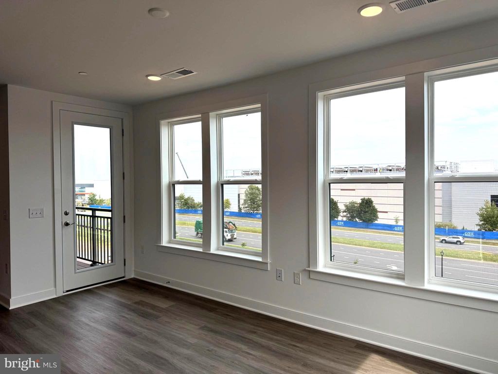 Photo of 21731 Dovekie Terrace #408, ASHBURN, VA 20147 (MLS # VALO2109436)