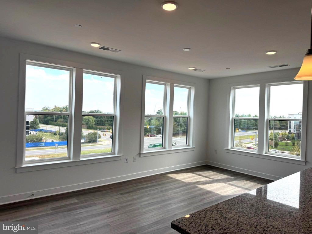 Photo of 21731 Dovekie Terrace #408, ASHBURN, VA 20147 (MLS # VALO2109436)