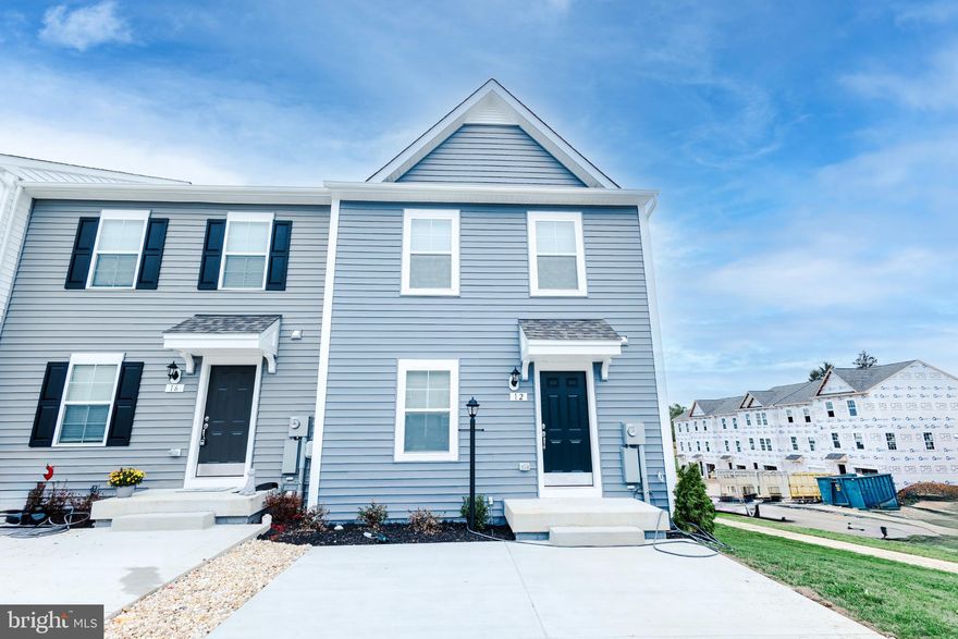 Discover an exceptional investment opportunity in the Townes at Tate Manor! This stunning end-of-row townhouse features 2023 construction and a modern living space, featuring 3 spacious bedrooms and 3.5 baths. The open concept design includes a kitchen with modern stainless steel appliances and a large island. The primary suite includes a walk-in closet and bathroom with a dual vanity, shower, and tub. This home is an excellent commuter location with proximity to Maryland and Virginia. The local community of Charles Town, WV, offers shopping, restaurants, and the famous local casino. Jefferson Memorial Park and downtown are within walking distance. (Photos are from the last vacancy. Updated photos will be added soon.)