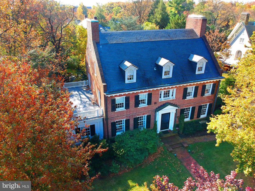 Open Sunday, Sept. 22nd 1:00-4:00 Desirably located on prestigious block of Greenway of architecturally significant homes close to Sherwood Gardens. Perfectly designed for entertaining indoors & out, this elegant & spacious, light-filled home w/high ceilings, 2 FPs & great flow features a landscaped, fenced, private oasis of a yard w/pool area. Magnificent living rm w/space for dining table, if desired. Handsome kitchen w/dark granite dining peninsula & butler's pantry area, gourmet appliances, and abundant cabinetry features large opening to dining rm w/FP which, if preferred, can function as a family room. Lovely master suite w/decorative FP, 2 sizable walk-in closets and spacious bath w/separate tub and shower. 2nd bedroom on 2nd floor w/private full bath, currently an office w/custom wood cabinets, accesses the balcony. 3rd 2nd floor bedroom has a newer bath & balcony access. Third level features 2 bdrms, 2 baths, sitting & exercise rooms. Beautifully customized 1st floor sunrm leads to awning covered patio. Spacious basement w/recreation room, workshop, bath and second laundry area. Charming studio room over garage.