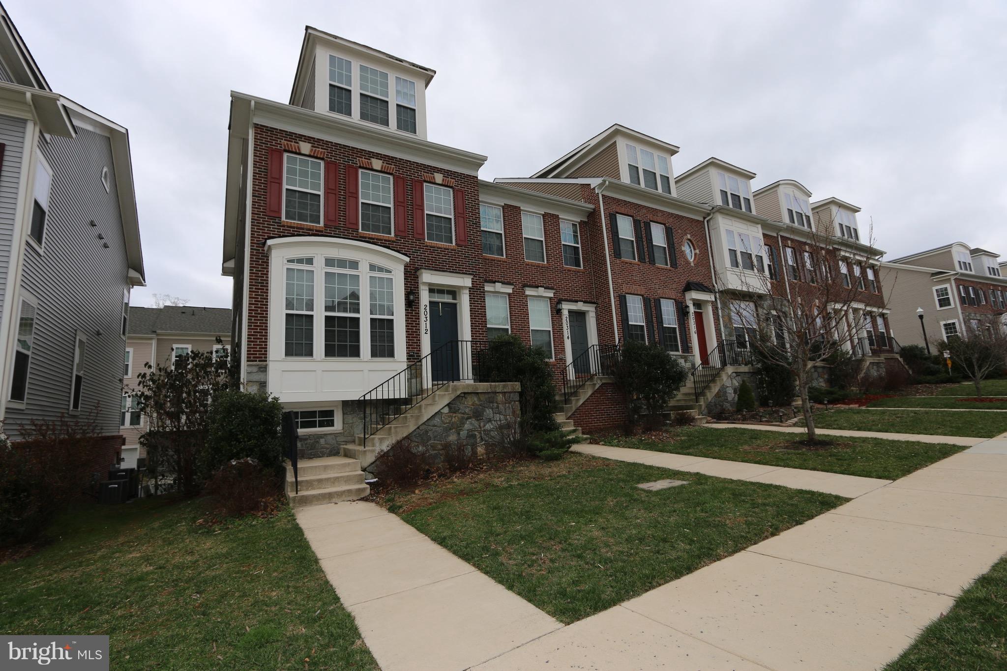 Beautiful luxury end unit TH. 4-level finished, 3 BR 3 FB & 1 HB. 2-car garage with opener. Modern kitchen with granite counter top. Master BR w/ sitting, luxury master BA w/ separate tub & shower. 2 other spacious BRs. Convenient location, easy access to shopping centers, I-270 & 355. Bus stop near by.