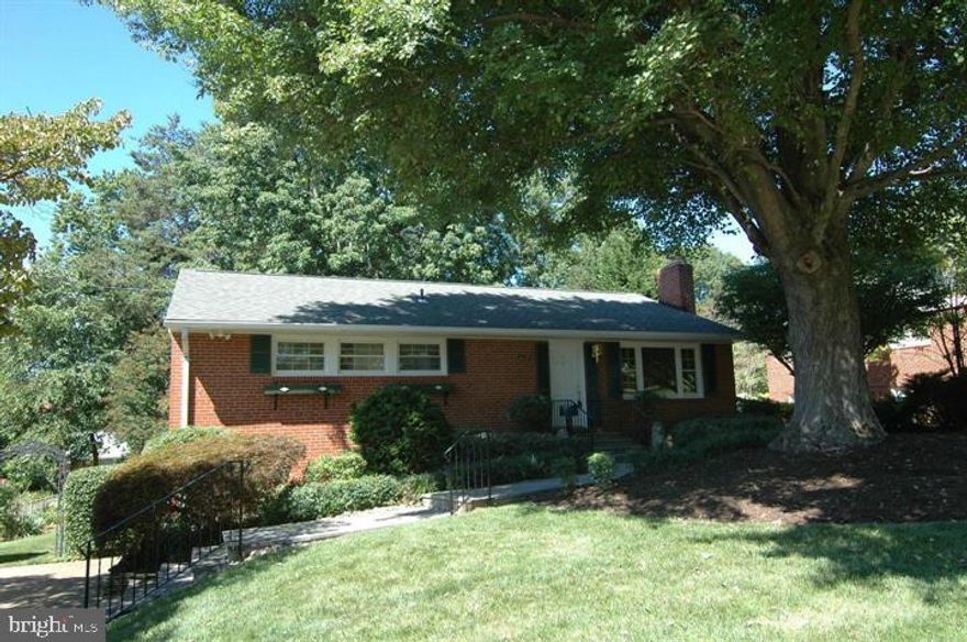 Wonderful home in fantastic close in location—close to schools, shopping and transpiration.  Pride of ownership shows — Hardwood floors main level with ceramic tile in kitchen—kitchen has white appliances with blush cabinets—door to amazing deck—Sunny lower level and beautiful yard