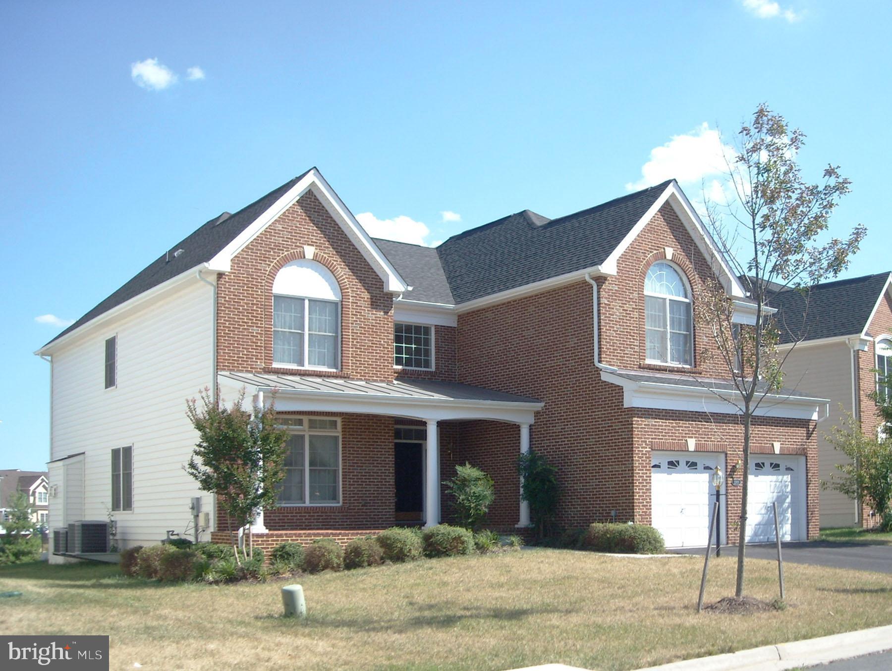 Available Now! Gorgeous 4BR/3.5BA/2Gar home with over 3,300 sf above grade . Brand new Luxury Vinyl Plank flooring on main level. Light-filled solarium and spacious office also on main level. 9+ ft Ceilings. 2-story foyer & family room w/ stone gas fireplace. Gourmet kitchen w/ granite counters & stainless steel appliances. Tiles in baths. Primary Suite w/Jacuzzi tub, separate shower & dual vanity. Trex deck. Community w/ parks, trails, workout facilities, tot lots & pools. Less than 3 miles/6min drive to the Ashburn Metro Station. About 1 mile/4min to Brambleton Town Center for groceries, banking, doctors, restaurants, shopping, movies and more! No cat. Dog case by case with $100 pet rent, and must be crate trained. Make your move before someone else does!