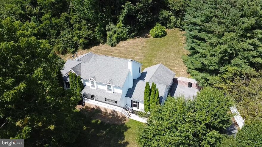 Welcome to this beautifully remodeled home in the rarely available neighborhood Tannery Manor. Nicely situated on 1.4 acres with amazing views and just 5 minutes from Winters Mill HS. This home has 2 garages with room for 4 cars/trucks and a long driveway lined with mature trees. Big covered porch and a huge deck in the back perfect for entertaining. Gorgeous kitchen with SS appliances including a wine cooler. Large sunroom with high ceilings and 2 entrances leading to a separate deck. Lots of natural light, recess lighting, and new cordless blinds throughout. Oversized family room, separate living room of dining room. Custom tile in remodeled bathrooms and in open foyer. Large shed in the private backyard. A must-see! No HOA.