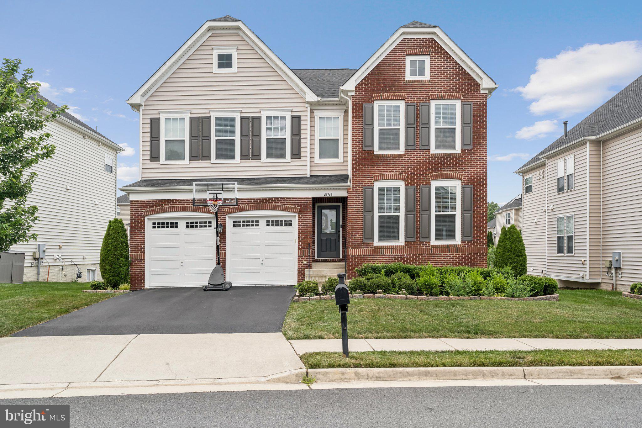 Welcome to this stunning colonial-style rental in the sought-after Stone Ridge neighborhood. With 6 bedrooms, 5 bathrooms, and more than 4,400 sq ft of finished living space, this move-in ready home (built 2016) offers abundant room for families or professionals working from home.
Enter on the main level to a bright, open layout featuring a formal living room, dining room, and a chef’s kitchen with ample cabinetry and counter space. The cozy family room includes a prefab fireplace, and flows seamlessly into the breakfast nook and backyard access.
Upstairs, find the generous primary suite with dual closets and a luxe bathroom. Four additional bedrooms and two baths complete this level—perfect for children or guests. The finished basement expands your functional space and entertainment space with a FULL kitchen and a recreation room, full bath, and laundry. Make this your personal retreat, home office, or exercise zone.
Enjoy an attached garage, driveway parking, and a low-maintenance yard in a community with sidewalks, green spaces,
Located just off Route 50 and the Greenway, commuting to Dulles, Fairfax, or D.C. is hassle-free. Nearby shopping, dining, and parks enhance the neighborhood lifestyle.