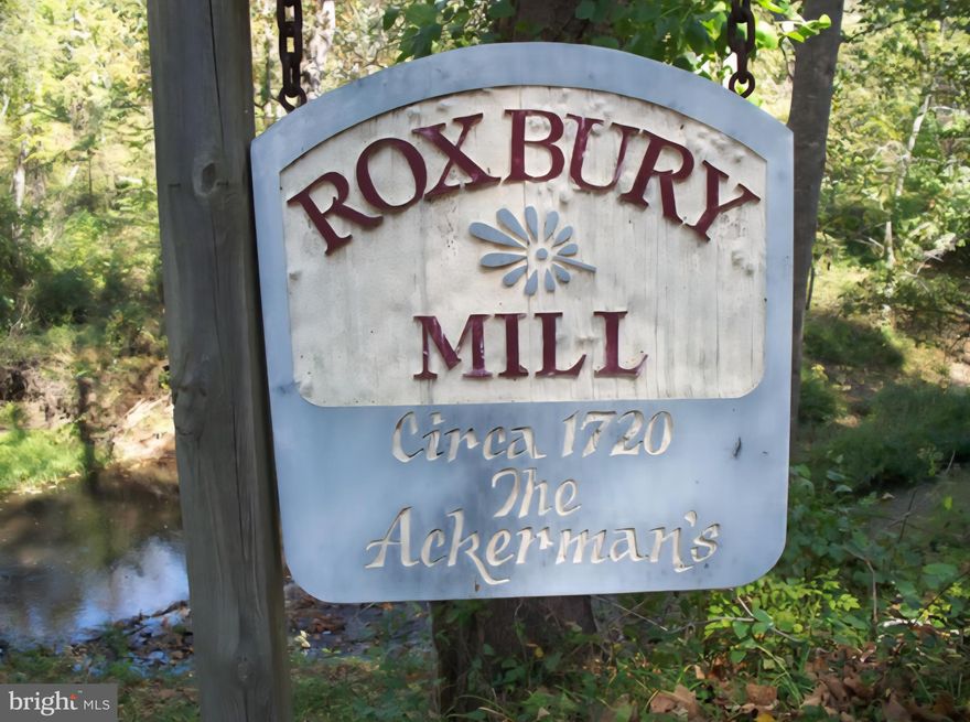 Step into a living piece of Virginia's past.  This site is steeped in history, with its origins tracing back to 1723 when Beverley Stanard built the original grist mill. This faithful mill, possibly known as Stanard Mill before it became Roxbury Mill, served the community until 1941, grinding for nearly two centuries. The property was also part of the historic "Roxbury Plantation," a vast 2,000-acre tract settled by the prominent Stanard family.  

A comprehensive archaeological reconnaissance was conducted on the Roxbury Tract in 1993 by The Center for Historic Preservation at Mary Washington College. This study included extensive historical and Civil War research, confirming the property's deep roots and potential for significant findings, with an artifact catalogue included in the report. 

Over the years, the mill and residential structures have been thoughtfully transformed, blending profound historic character with modern comforts. The expanded structure, meticulously renovated in a rustic style using old beams and posts, offers flexible living arrangements across four floors and totaling approximately 4,775 square feet.  The interior potentially accommodates up to six bedrooms, along with five and a half bathrooms, a spacious living room with a historic metal sign that once adorned the mill exterior, a welcoming family/dining room, an elegant parlor, a rec room, a convenient second kitchen area, and a charming loft.  

A Glimpse into Civil War History: This property isn't just old; it's witnessed pivotal moments in American history. Documents from the National Park Service confirm that Union and Confederate soldiers engaged in combat on at least three occasions at the Telegraph Road crossing on the Po River, with fighting likely occurring on the portion of the estate east of the road and north of the river, within what was known as the Stanard estate.  

Preserving its heritage, the property features the original dam that once powered the mill, and the original millrace still actively flows. And, with the picturesque Po River flowing through the property, there's documented potential for hydroelectric power. A 1981 study prepared by the U.S. Department of Energy and the Virginia Office of Emergency and Energy Services specifically inventoried existing dams, including this one, for their hydroelectric potential ranging between 100kw and 30,000kw, offering a unique opportunity to harness the river's energy for sustainable living or even income generation. The Po River also offers excellent fishing opportunities across the 3.69 acres of expansive grounds. 

Beyond a private residence, this property presents a multitude of possibilities. Its historic charm and ample space make it ideal for a bed and breakfast, offering guests a unique and memorable experience. In fact, it was previously run as a successful B&B a testament to its proven suitability for hospitality, drawing guests from as far as Kuwait to California. The expansive grounds and picturesque setting also lend themselves to use as an event venue for weddings, retreats, or other special occasions. Alternatively, the property could be transformed into a charming restaurant or farm-to-table establishment, leveraging the natural beauty and proximity to the river. The possibilities are as vast as the property's rich history. 

This unique property offers a rare chance to own a true piece of American history, where the echoes of the past harmonize with the tranquility and potential of the present. Septic system will need upgraded/updated depending on future use of property.