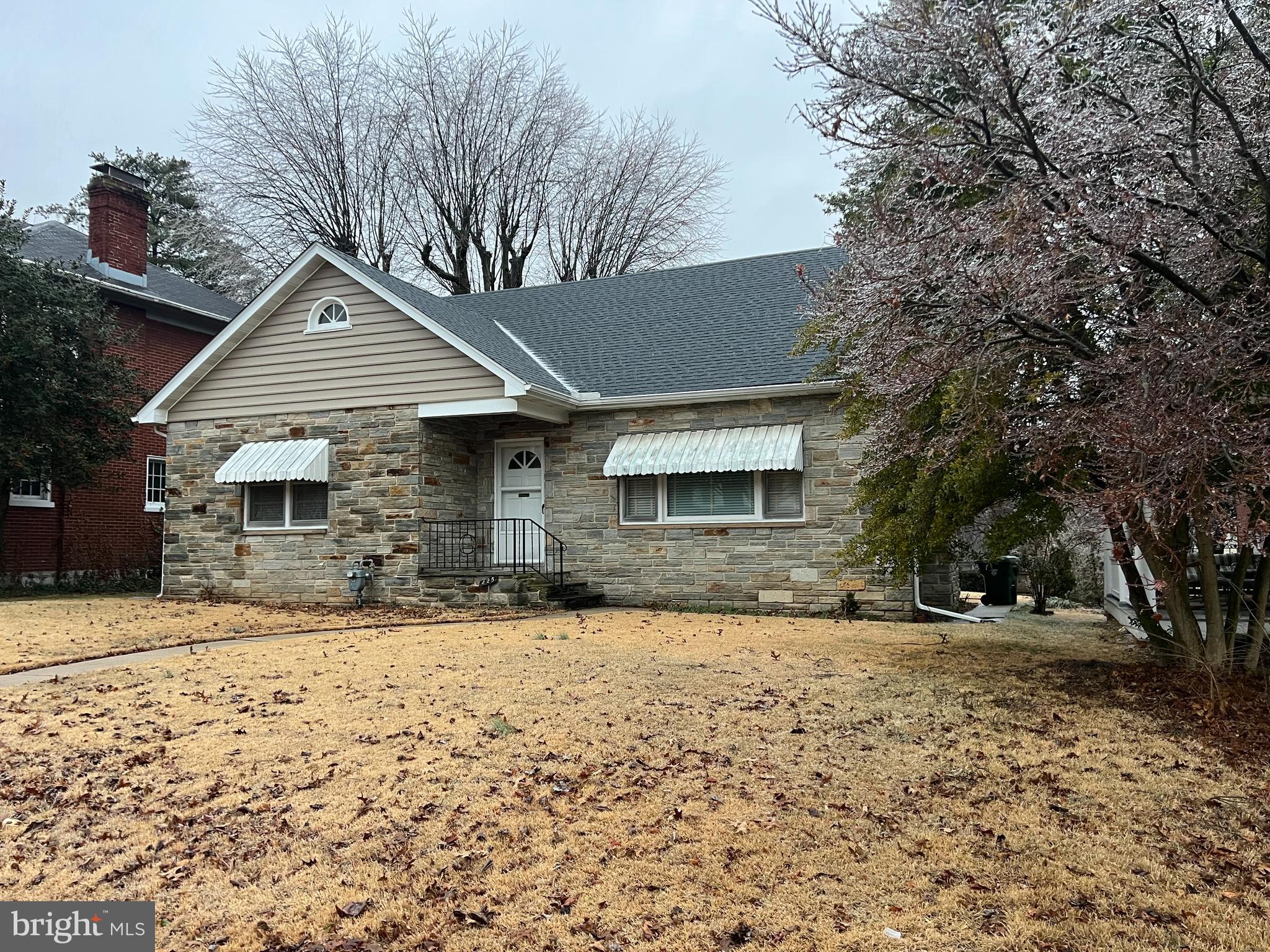 Welcome to the sought after North End of Hagerstown. The tree lined street of Mealey Parkway is the perfect area for long walks on sidewalks lined with mature established trees and conveniently located to all types of shopping and only a few blocks to one of the beautiful Historic areas of Hagerstown. The home features Hardwood floors and knotty pine kitchen. Both the living room and finished family room on the lower level have a woodburning Fireplace. The kitchen has room as an eat-in or use the formal dining room.
The classic tiled bathroom and antique sink is original to the home and in great condition. The practically new natural gas super efficient hot water heat system is the best most comfortable heat there is. The new roof was replaced within the last two years.
The cut stone exterior sets this home apart from others in the neighborhood. The oversize garage entrance is located in the rear of the house from the alley.
Come check it out and see if this is what you're looking for.