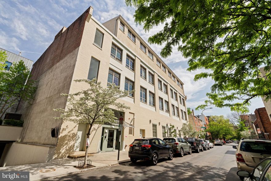 Introducing an expansive penthouse unit with covered parking, in the rarely offered Riverpark Condo Building, this exquisite two-bedroom, two-bathroom boutique condominium is a hidden gem in the heart of Fitler Square.

Upon entry, you'll find a grand front hall with a skylight, stone tiles, and ample storage closets. A bedroom/TV room awaits, complete with a large closet featuring fan-cooled wiring for a flatscreen. The office space features built-in custom countertops and shelving. Mullioned glazed windows provide an abundance of natural light, enhancing the ambiance of this retreat.

The gourmet kitchen features a Subzero fridge, African cherry veneer cabinetry, and top-of-the-line appliances including a double wall oven and six-burner Viking cooktop. Sleek design elements include Matt stainless steel backsplash tiles and ceiling track lights. The living room boasts a 15-foot ceiling, suspended track lights, and ten-foot windows. Convenient under-stairs storage and cherry flooring complete the main level.

Ascend to the second floor to find the serene primary bedroom, featuring marine-quality double glass doors for deck access. The walk-in closet is designed with high- and low-bar garment hanging bars, a built-in shoe rack, and shelf storage. The spa-like primary bath boasts neutral stone shower tiles, a custom Greek scroll pattern trim line, and a two-person jacuzzi with a window view.

Further down the hall, you'll find a versatile space that can serve as a library or a sofa bedroom. This area is adorned with wall-length custom white wooden bookshelves and storage, adding to its functionality and charm. The exterior wall is decorated with marine-quality double glass doors and side panels, offering access to the deck. For convenient deck entertaining, there is a folding-door concealed upstairs kitchenette equipped with a dishwasher, waist-high fridge, garbage disposal, instant hot water faucet, and four-door glass-fronted upper cabinets.

Step outside to the expansive deck with a dining set for eight, surrounded by Veredek-quality containers. Enjoy sweeping views of the Center City skyline, creating a picturesque backdrop for gatherings or peaceful reflection. The deck features a custom railing, a four-burner grill with a lower cabinet, and an automatic watering system, creating an outdoor oasis perfect for entertaining or relaxation. Additional features include a garage parking space, a whole-house sound system, and top-of-line materials throughout.

Located in the heart of Fitler Square, this residence offers easy access to dining, shopping, and entertainment venues, while surrounded by lush greenery and parks.