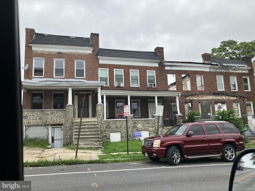 Large House across from Carver Vocational Technical High School, 4 bedrooms on upper level and two rooms that could be used as bedrooms on first floor for a total of 6 possible bedrooms, huge unfinished basement, central air conditioning, hardwood floors, 2 full bathrooms, front porch.