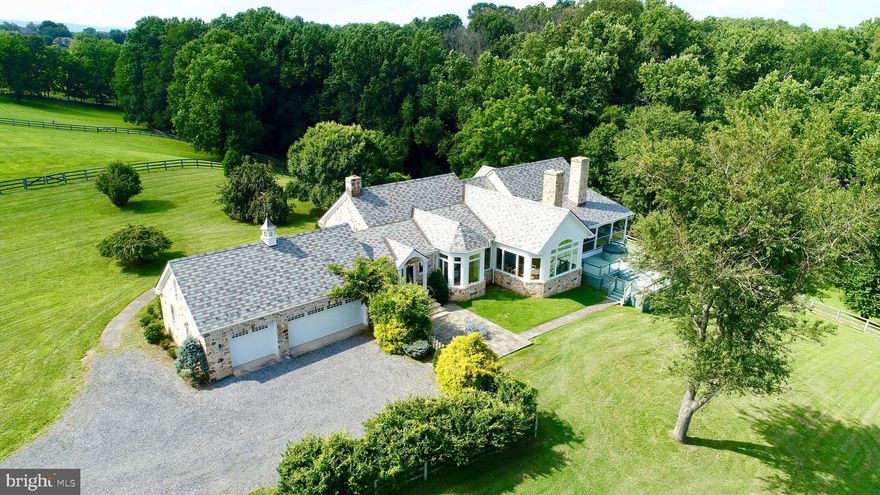 Beautiful Middleburg Estate. This Stone Cape Cod has a top of the line slate roof. The property sits on over 40 scenic acres. Over 4,000 sq. ft. with 4 bedrooms and 4 bathrooms on the main level. One additional bathroom on the finished lower level. Huge windows allowing abundant natural light. The master bedroom has a floor to ceiling stone fireplace and the master bathroom contains Onyx tile and Newport brass fixtures. Park-like setting with three sides of the property bordering historic Goose Greek. Horse lovers - do not miss this one-of-a-kind center aisle barn with 6 stalls!