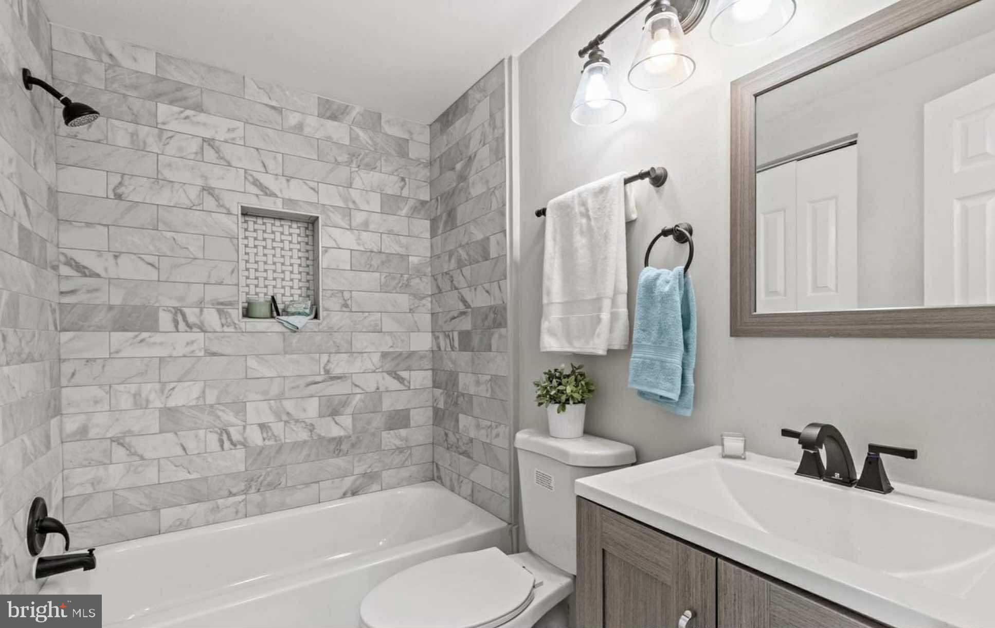 Welcome Home to this wonderful turnkey townhome. This light-filled home is ALL NEW! 2024 UPGRADES include ALL NEW Roofing attic insulation with solar panels, energy efficient doors and windows, Stainless steel appliances, NEW quality cabinets, NEW Quartz countertops, NEW hot water heater, NEW HVAC (inside and outside unit!), NEW stacked SAMSUNG full size washer and dryer, NEW upgraded bathroom including NEW tub and vanity. Both levels of the home feature upgraded NEW luxury flooring. A fresh coat of paint inside and outside! The spacious owner's bedroom boasts a large walk-in closet, sitting area perfect for a home office or work-out space, and a private deck. A commuter's dream, this home provides easy access to I-270, 355, Shady Grove Metro Station, Gaithersburg Park-and-Ride, the MARC train, and is just a short walk to the Ride On bus stop. Also located nearby is the newly revamped Montgomery Village Shopping Center, brand new Lidl grocery store, Gaithersburg Library, Costco, Lake Forest Mall, restaurants, shopping, and so much more! Outdoor lovers will be thrilled to find Lake Whetstone Park just steps from the front door! The 37 acre park includes a playground, boat dock, boat rentals, fishing spots, and a jogging trail that hugs the shoreline and offers beautiful scenery all year long. Your HOA fees give you access to six community pools (including the heated Stedwick Pool and recently renovated Peggy Mark Pool that features a spray ground and a lazy river!), and many baseball fields/tennis courts/basketball courts/ playgrounds/etc. There is also a large variety of classes, camps, community events, and more offered through the Montgomery Village Foundation.