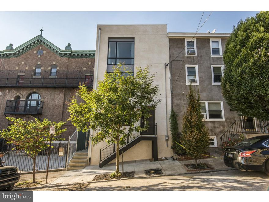 Welcome to Manayunk's newest residence just steps away from vibrant Main Street.  Whether you are taking the train to the city or catching a bite on Main St., you can't get any closer to the action.  This newly built end unit features a contemporary design with lots of natural light from windows on three sides.  Step inside and see for yourself.  The main floor of this beautiful home has an open concept and welcomes you to the living room, dining room, and eat-in kitchen.  This great room features gorgeous bamboo floors, windows on three walls, recessed lighting, a powder room, a custom kitchen, and access to the rear deck and beautiful fenced-in yard.  The kitchen boasts granite counters and a 10' peninsula offering plenty of space for entertaining, prepping and dining.  Additionally, the kitchen has floor-to-ceiling cabinets, stainless steel appliances, tiled backsplash, and a walk-in pantry. The outdoor space offers an expansive deck large enough for dining, grilling, and chilling as well as a large lawn. On the second floor you will find two equally spacious bedrooms, each with its own full bathroom, plenty of closet space, and lots of natural light.  A conveniently placed laundry room is located in the hallway.  The bamboo hardwood floors continue throughout the second and third floors.  The master suite sits on the top floor overlooking the streets of Manayunk and the natural setting of the backyard.  Inside this suite you will find a bright, spacious bedroom with plenty of closet space, an en-suite bathroom with dual sinks, tiled shower, and soaking tub. Completing the master suite is additional living space that can be used as a nursery, an office, exercise room, or anything else you desire.  It could also be converted into a 4th bedroom. There is a partial basement perfect for storage.  Enjoy all the benefits of owning new construction, which includes a 10 year tax abatement.
